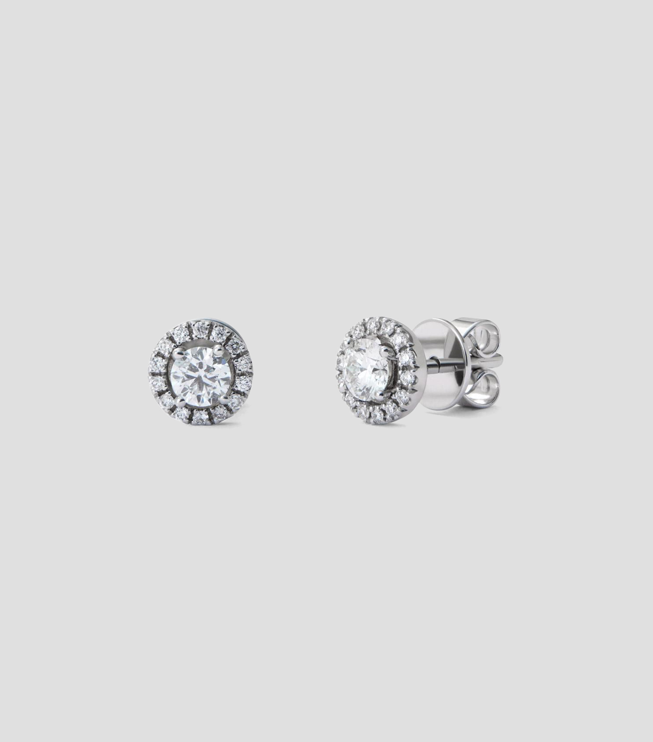 Aretes en Oro blanco de 18 Kilates botón con diamantes Mujer