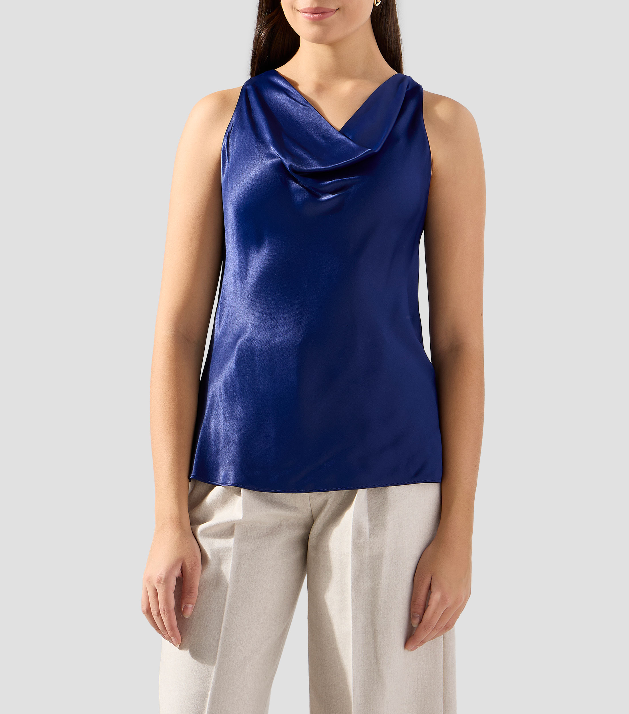 Blusa lisa sin mangas Mujer