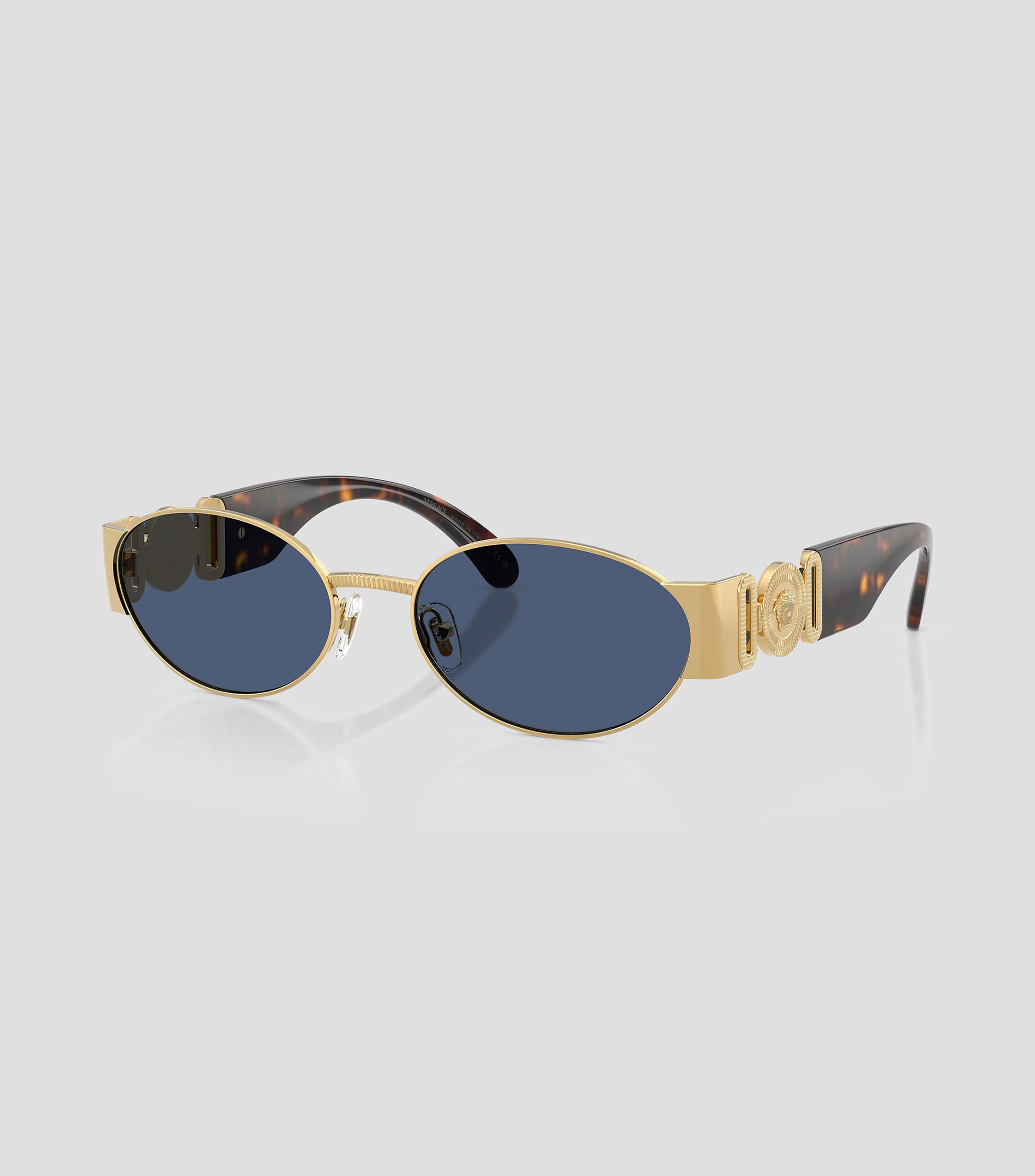 Lentes de sol ovalados dorados Hombre