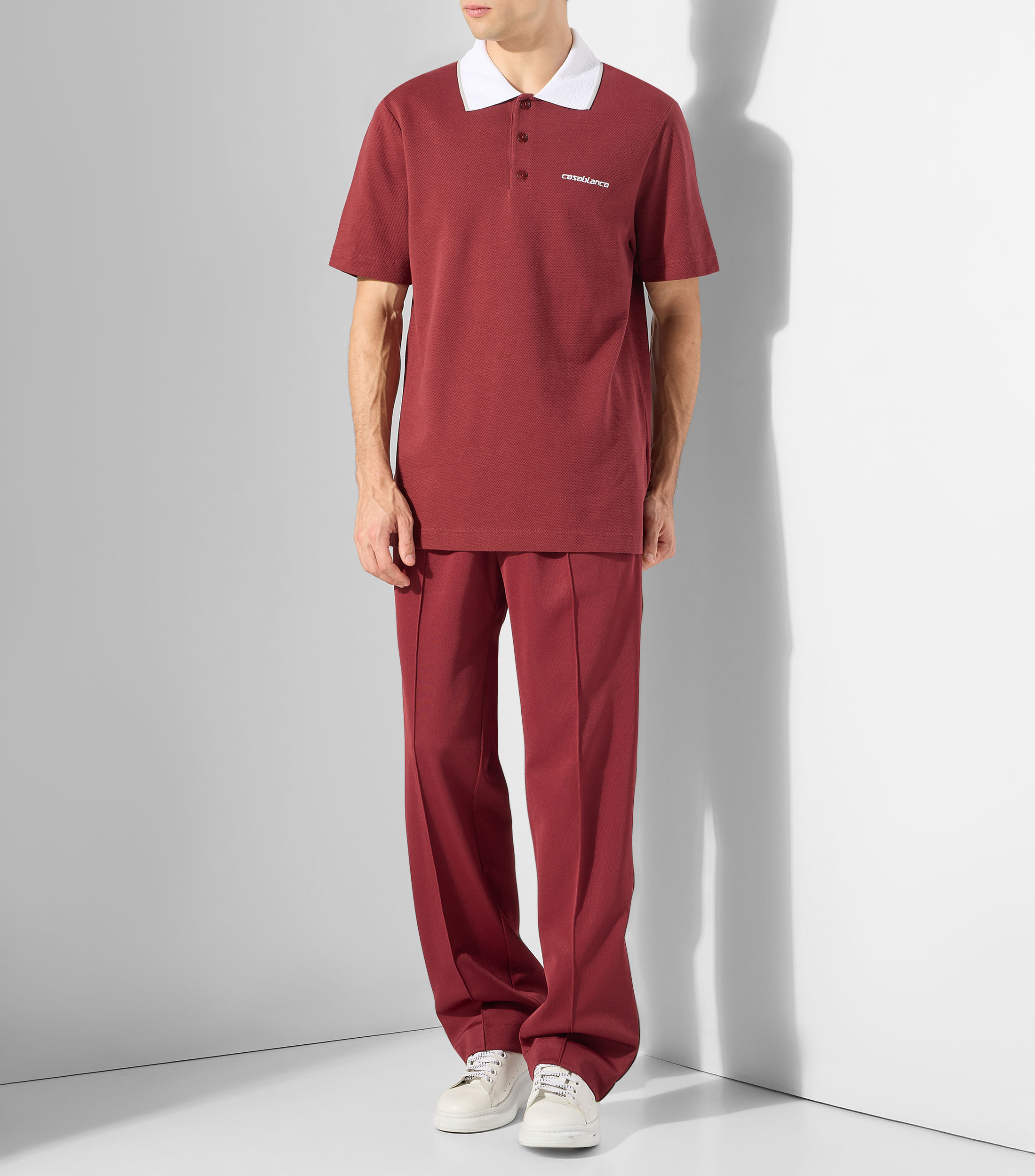 Playera tipo polo con manga corta lisa Hombre
