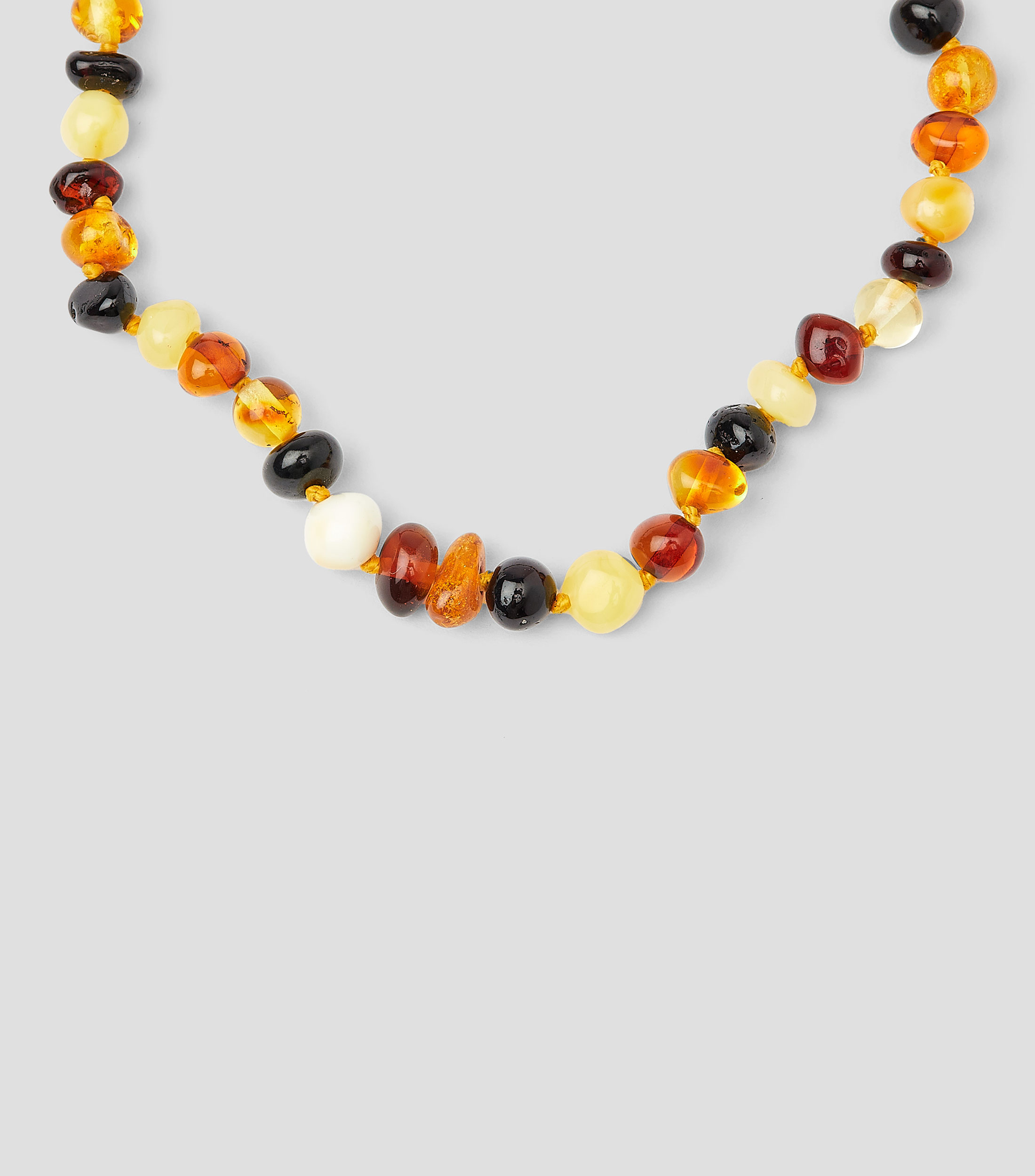 Collar de tres tonos con ámbar Bebés
