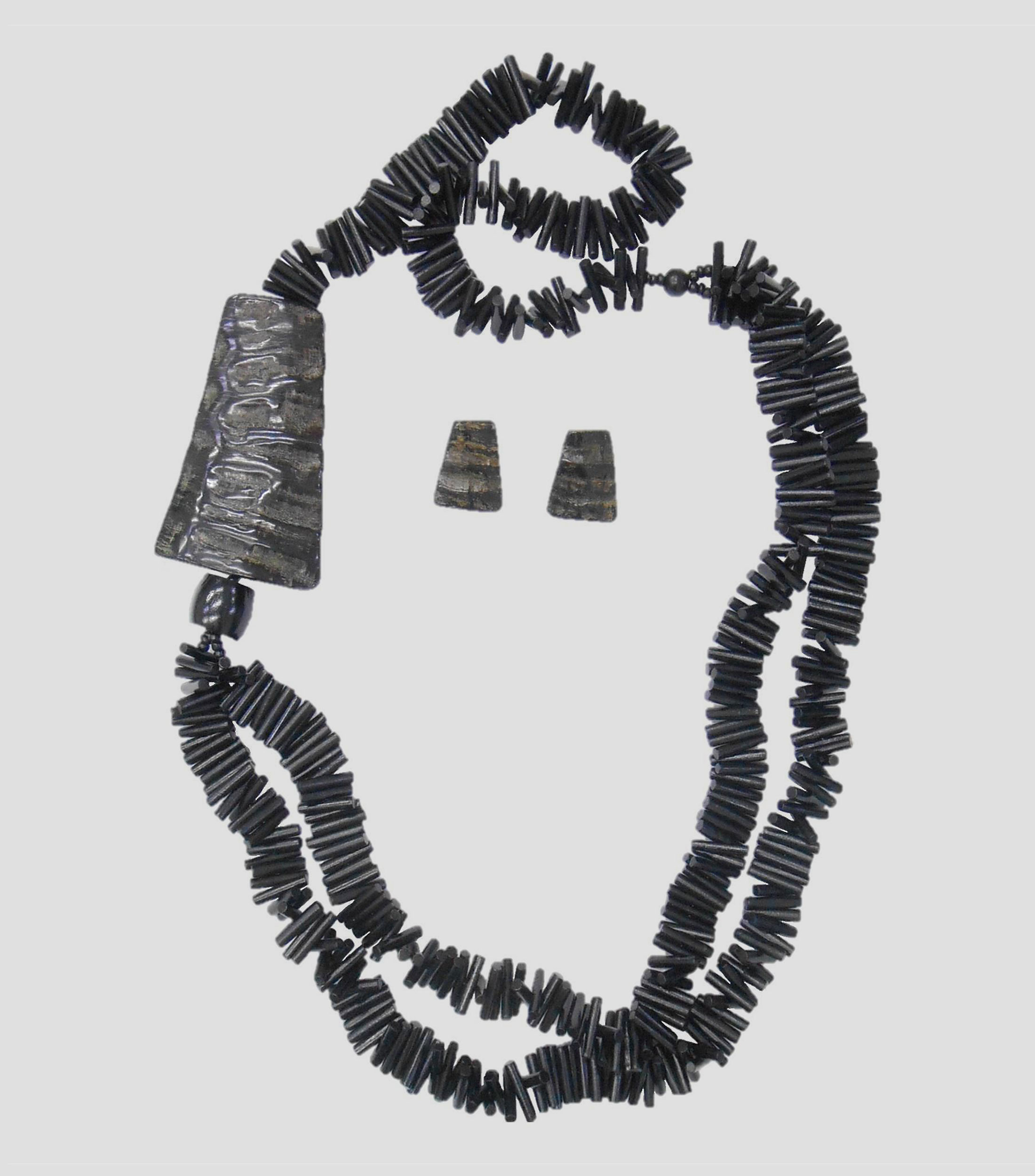 Set collar y aretes Mujer