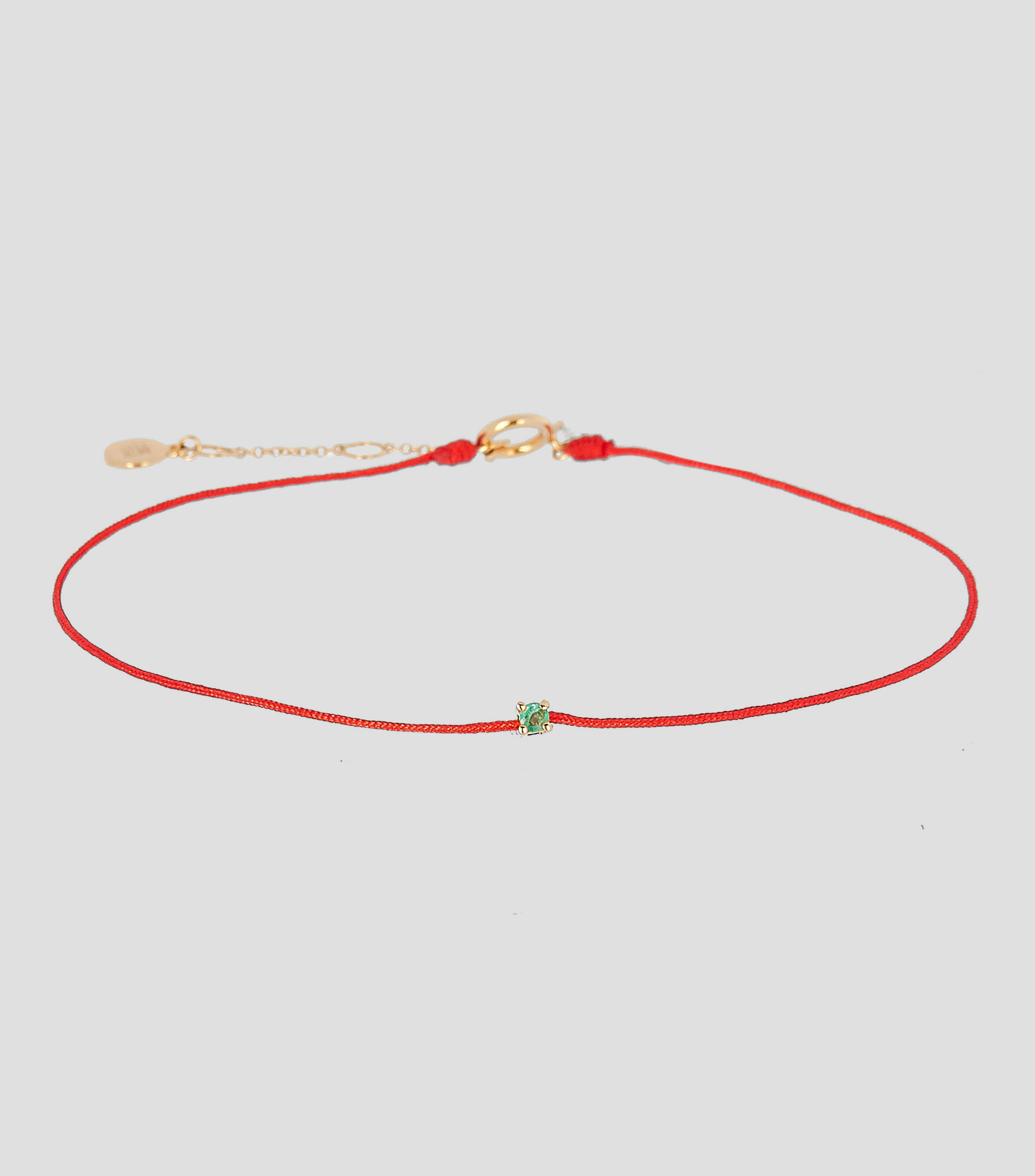 Pulsera en textil con punto de esmeralda Mujer
