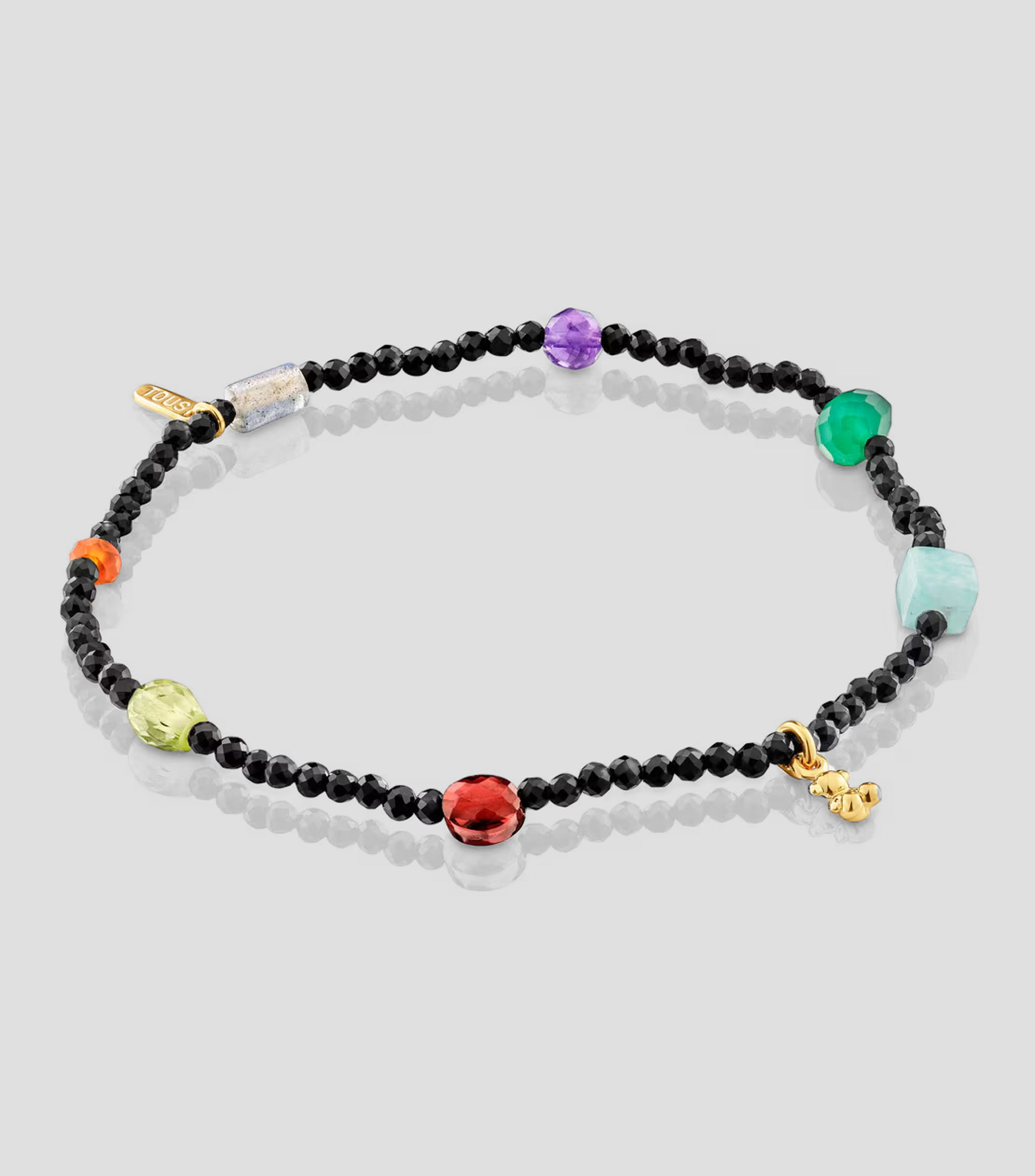 Pulsera elástica con dijes Mujer