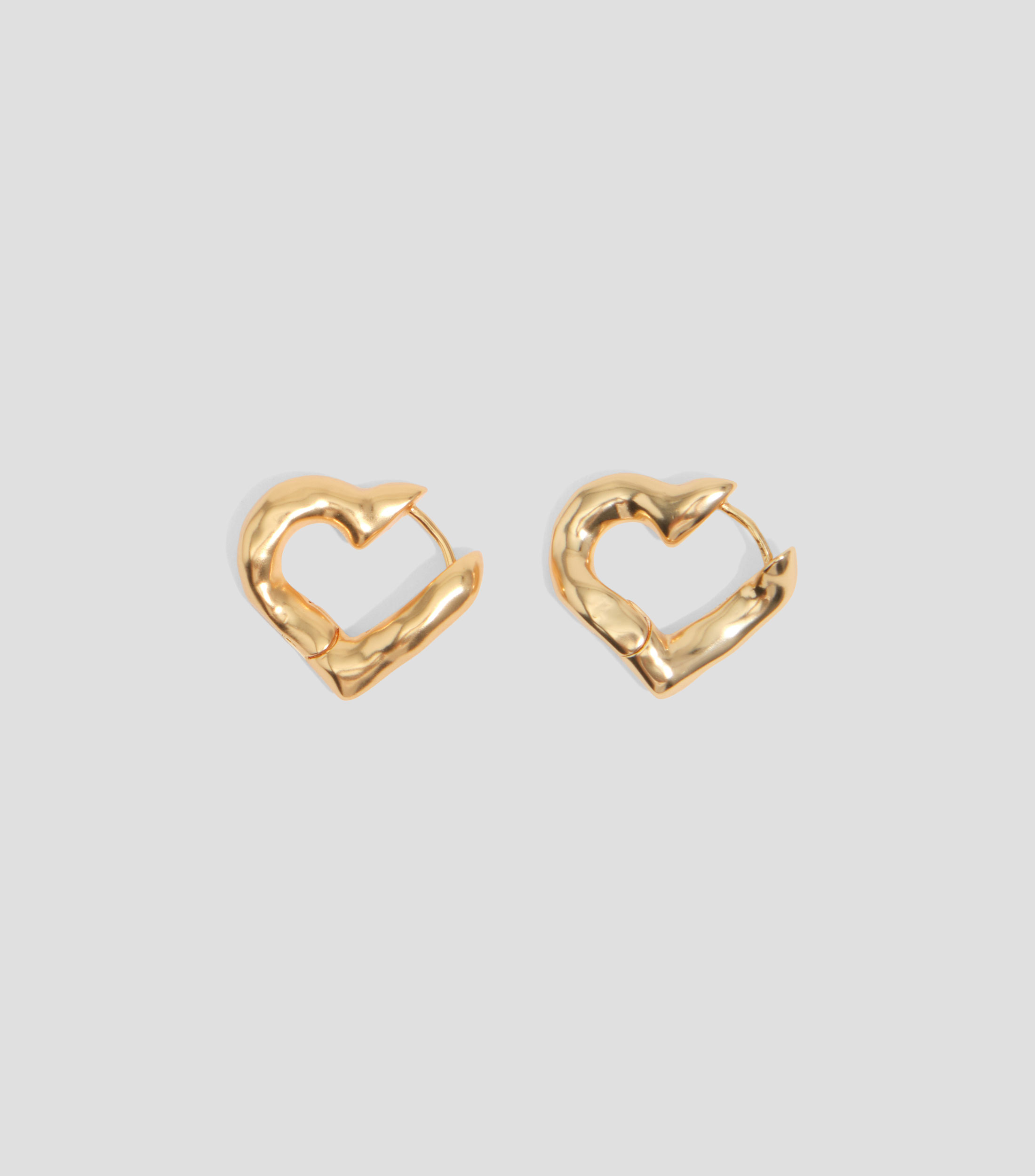 Pendientes aro corazón con textura Mujer