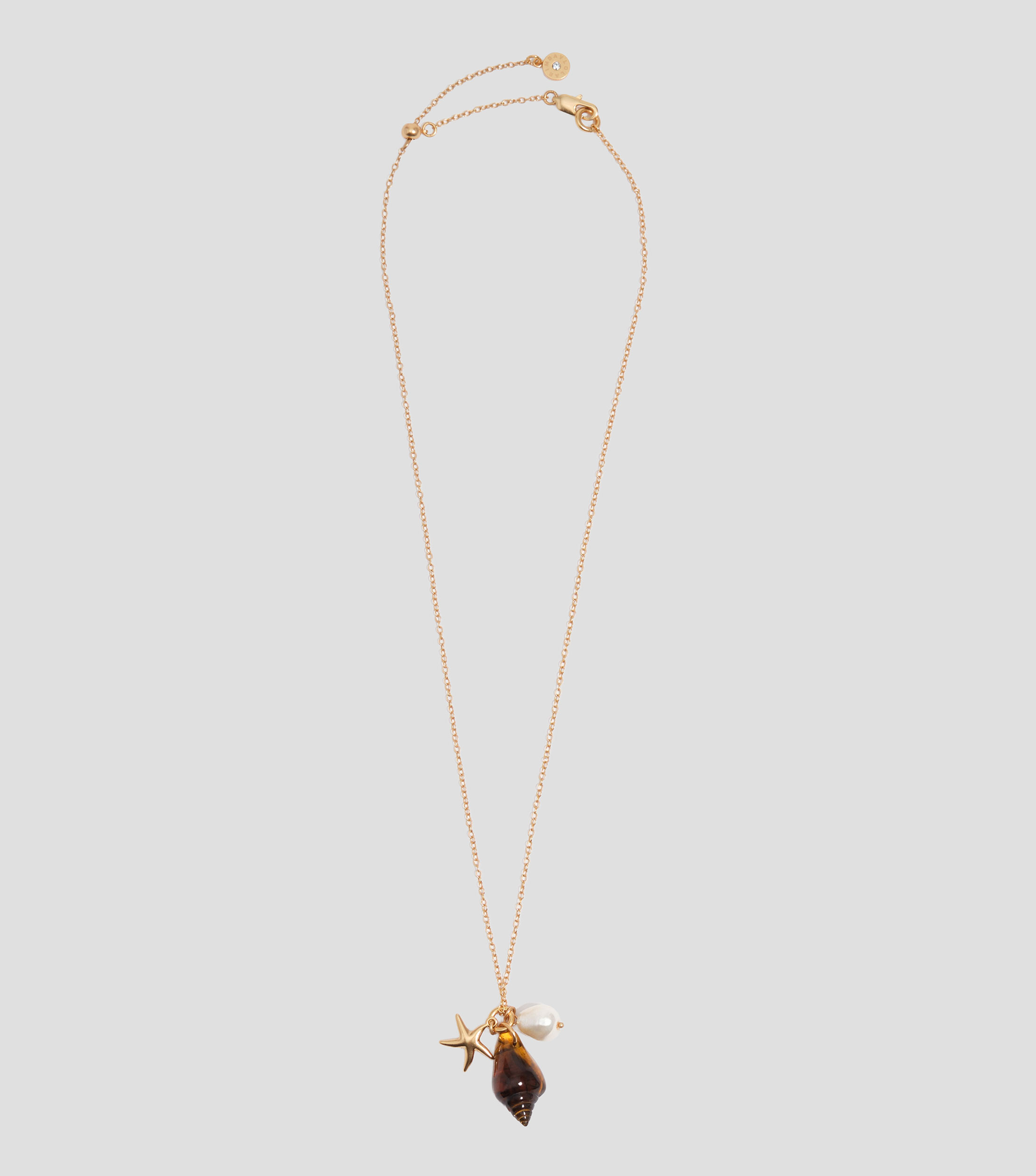Collar con estrella, caracol y perla con dorado envejecido Mujer