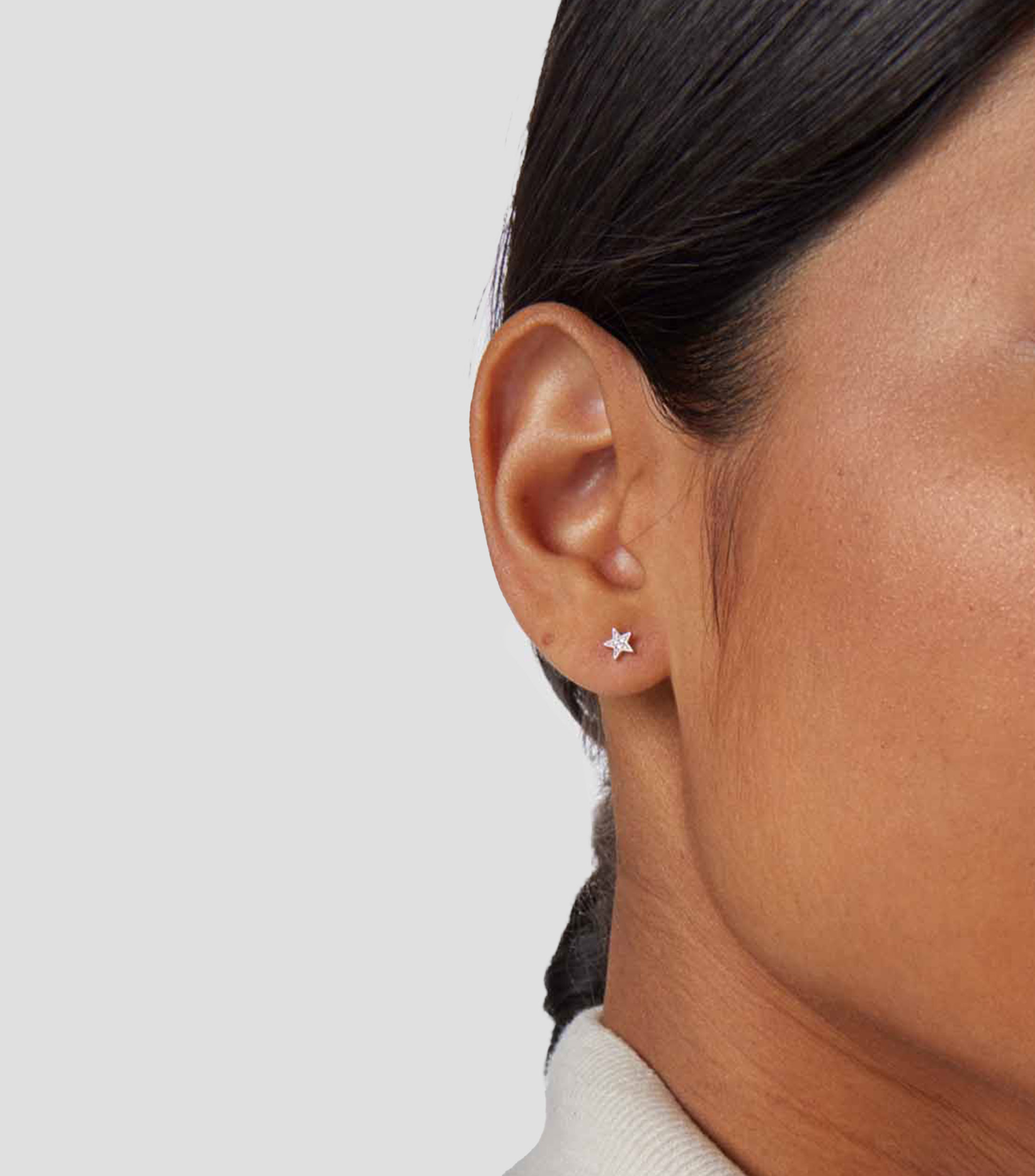 Aretes en oro blanco de 18 kilates con diamantes Puppies Mujer