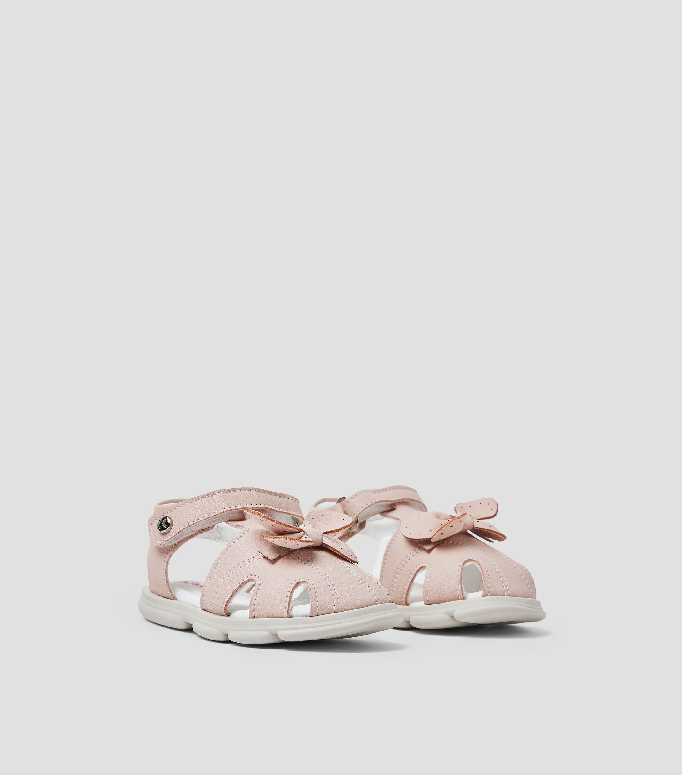 Sandalias planas con moño Niña