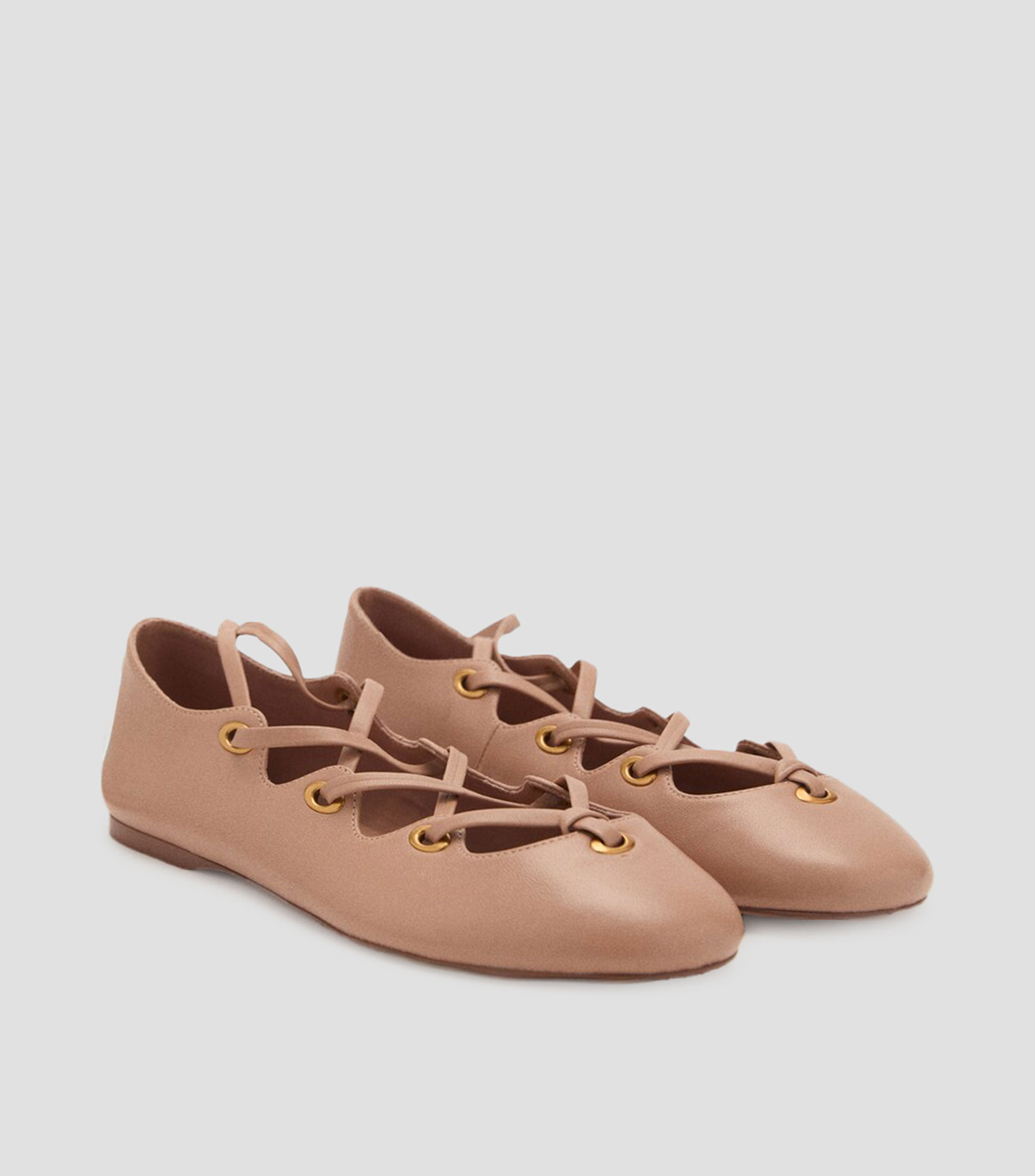 Flats en piel con tiras cruzadas Mujer