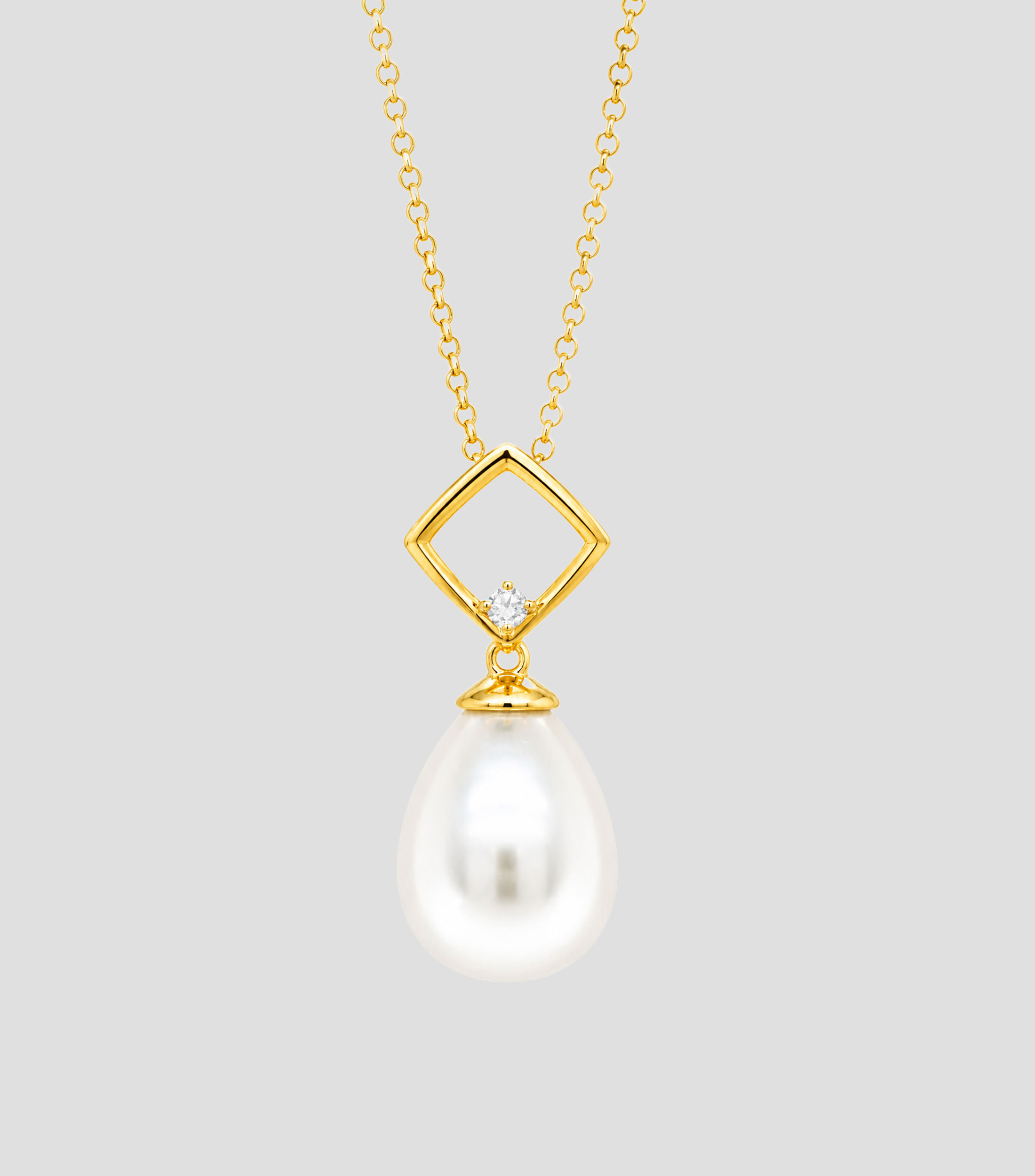 Dije con cadena en Oro de 14 Kilates Mujer