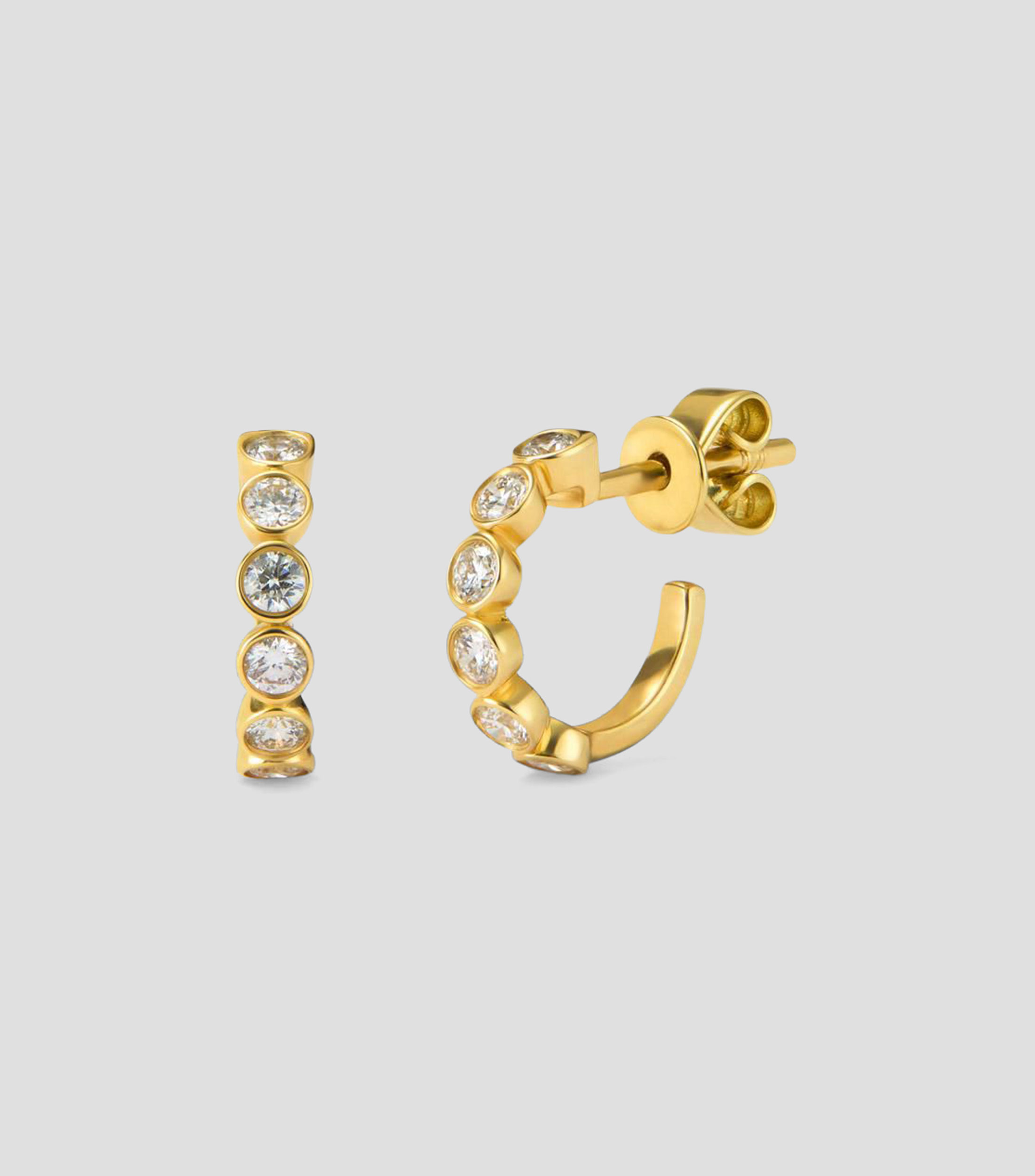 Aretes de aro en Oro amarillo de 18 Kilates con 12 diamantes en talla brillante Mujer