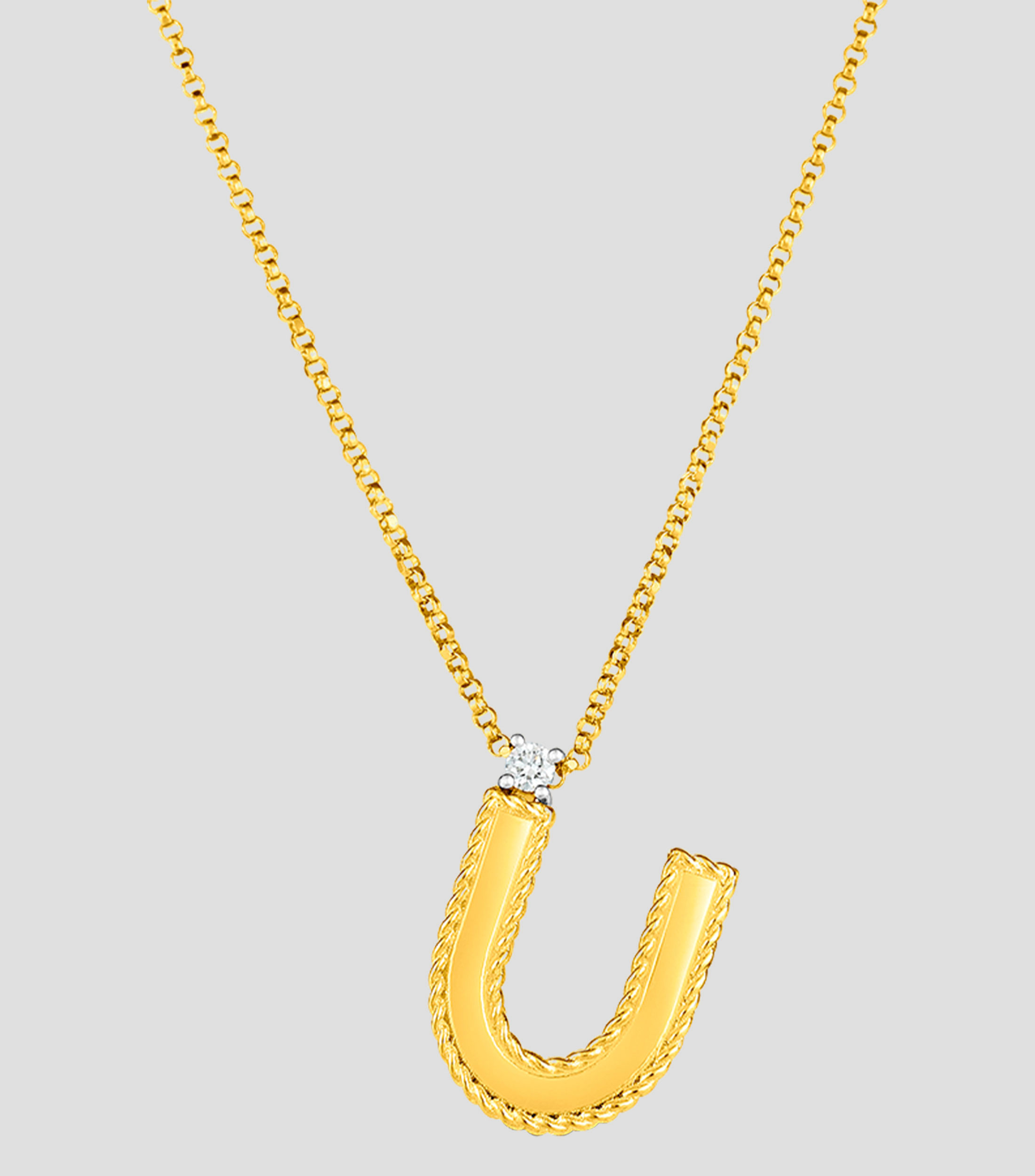 Collar en oro amarillo 18 Kilates letra U con diamante Mujer
