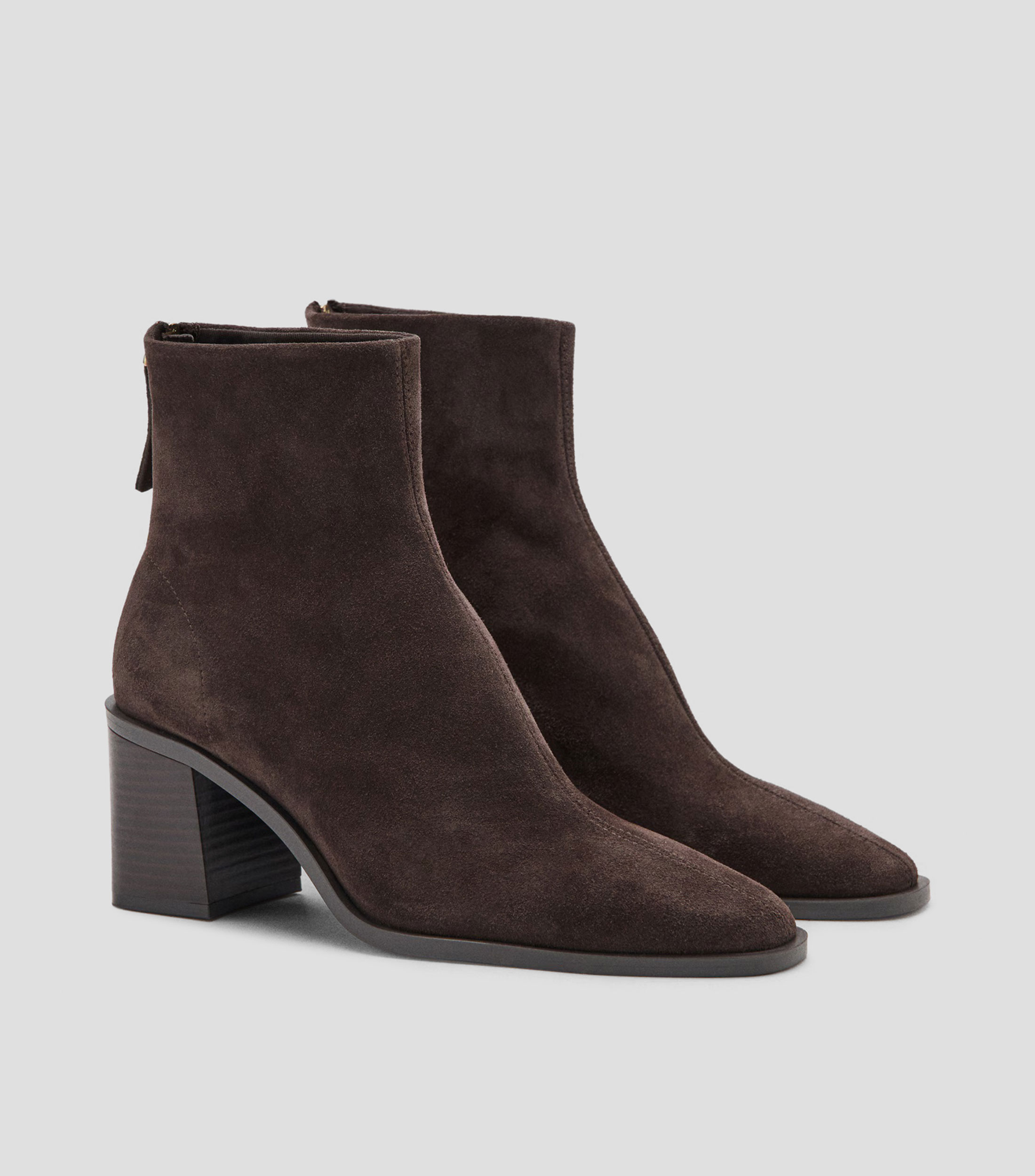 Botines casuales en piel con tacón medio y ancho Mujer