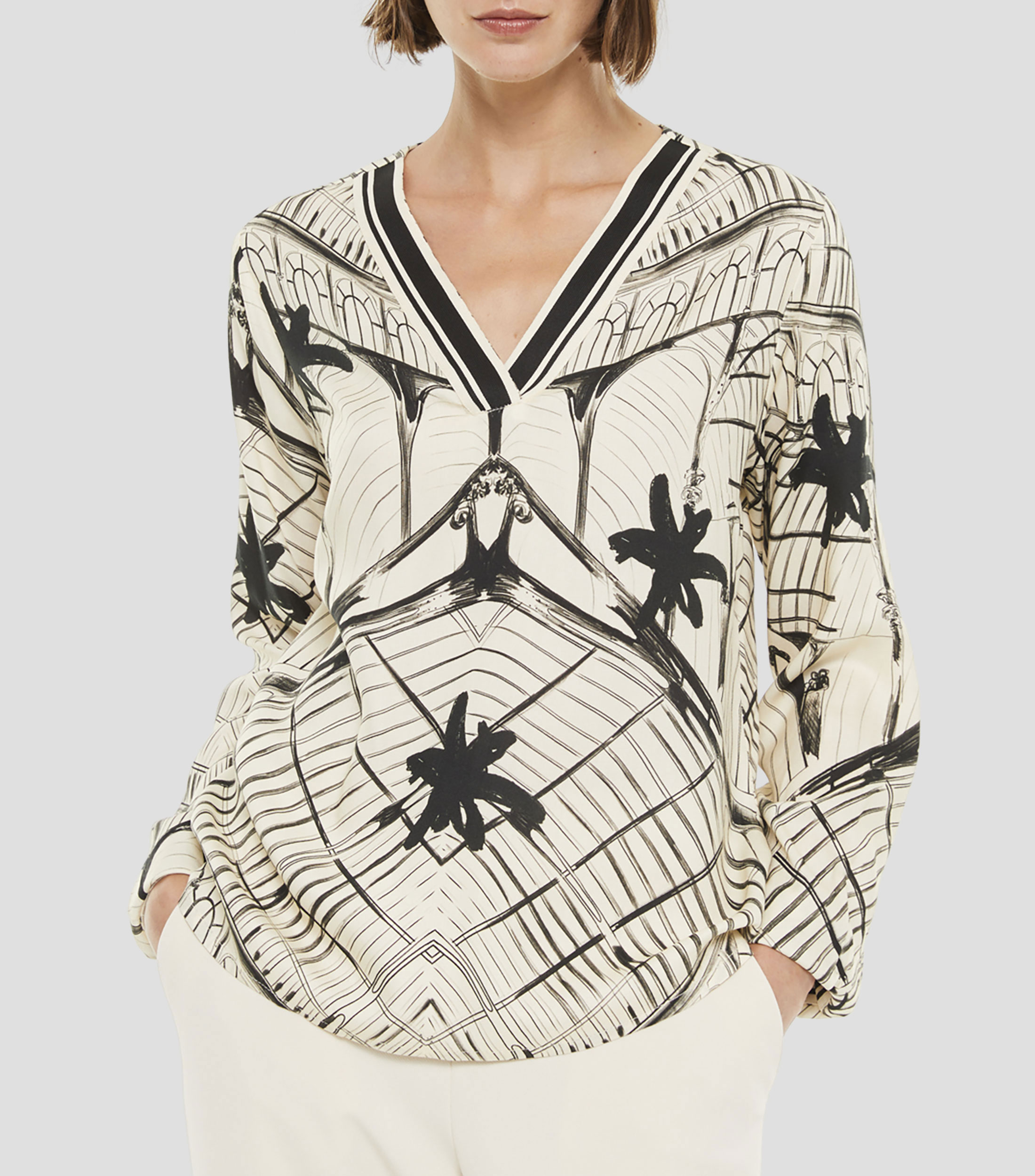 Blusa estampada con manga larga Mujer