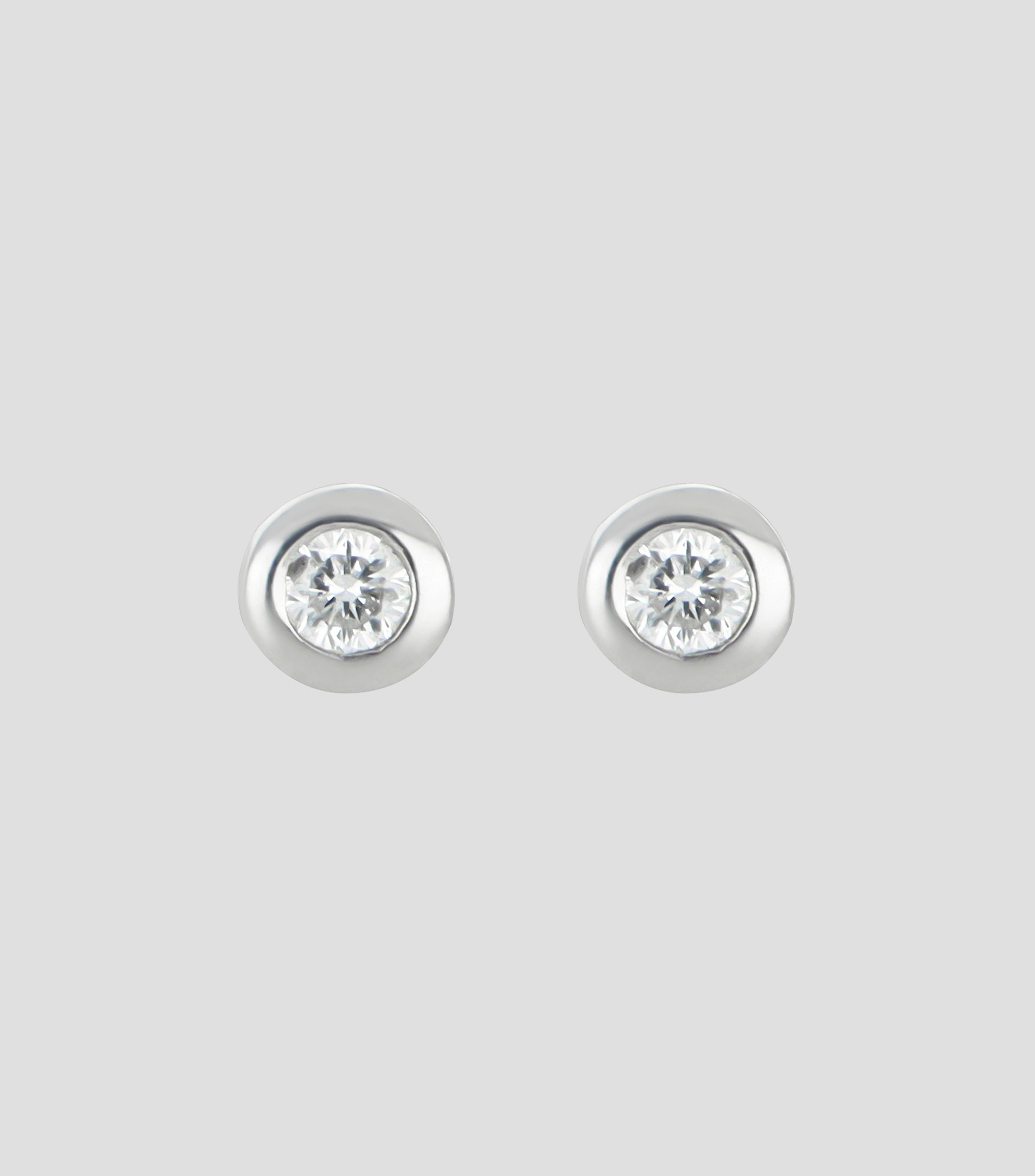 Broqueles en oro blanco de 14 kilates con diamante Mujer