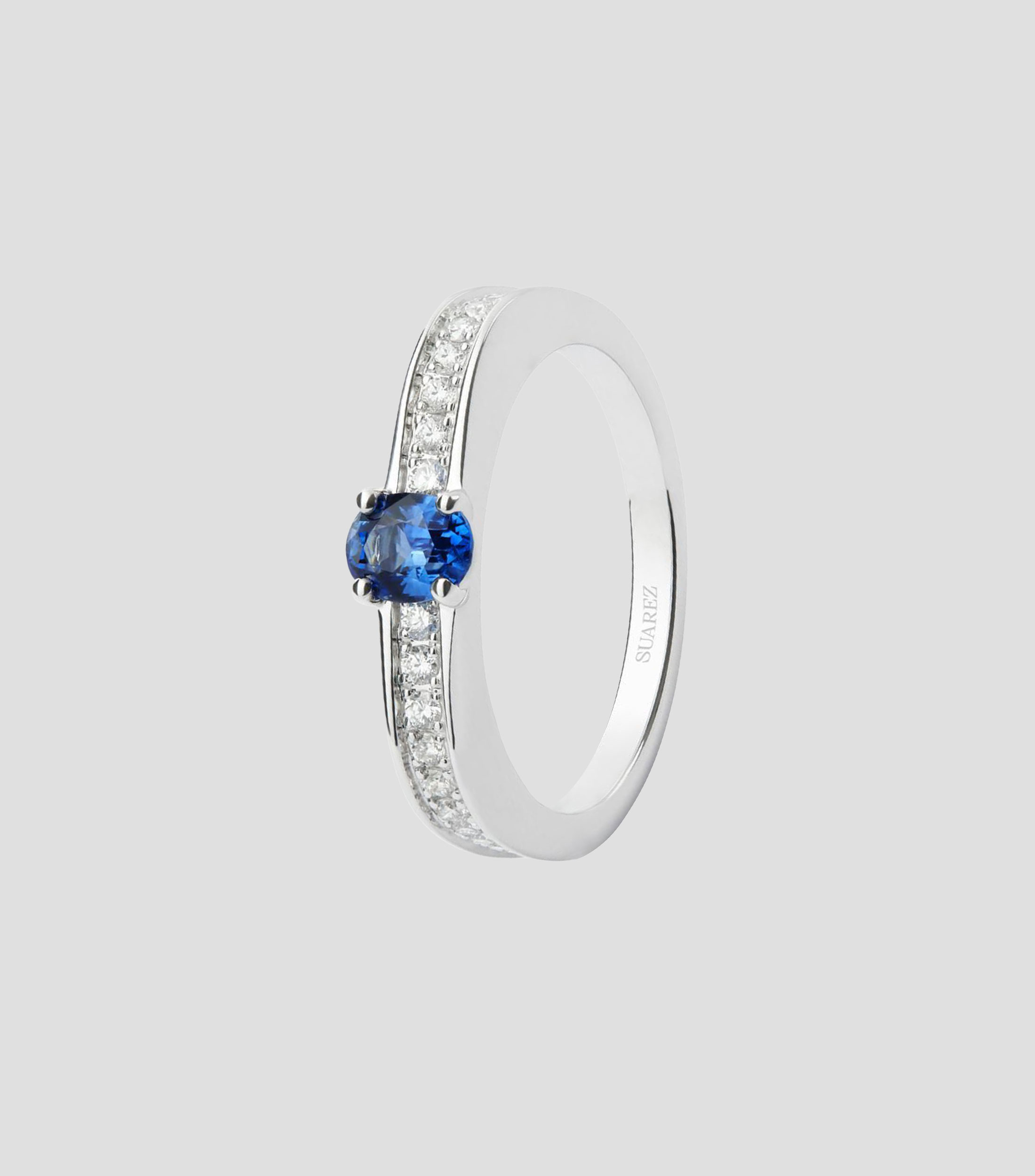 Anillo solitario en oro blanco de 18 Kilates con zafiro y diamantes Mujer