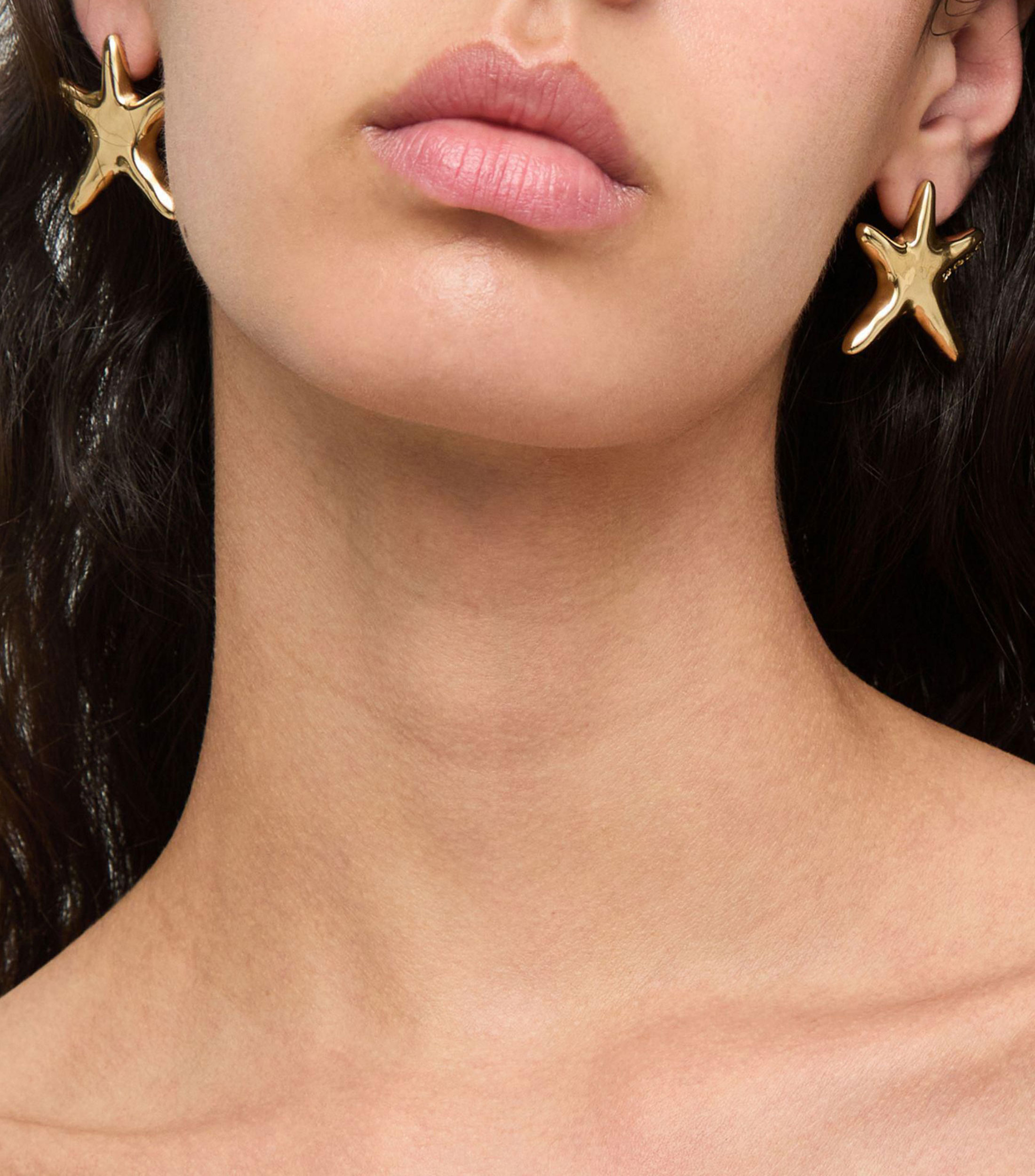 Aretes medianos estrellas Arcadia Mujer