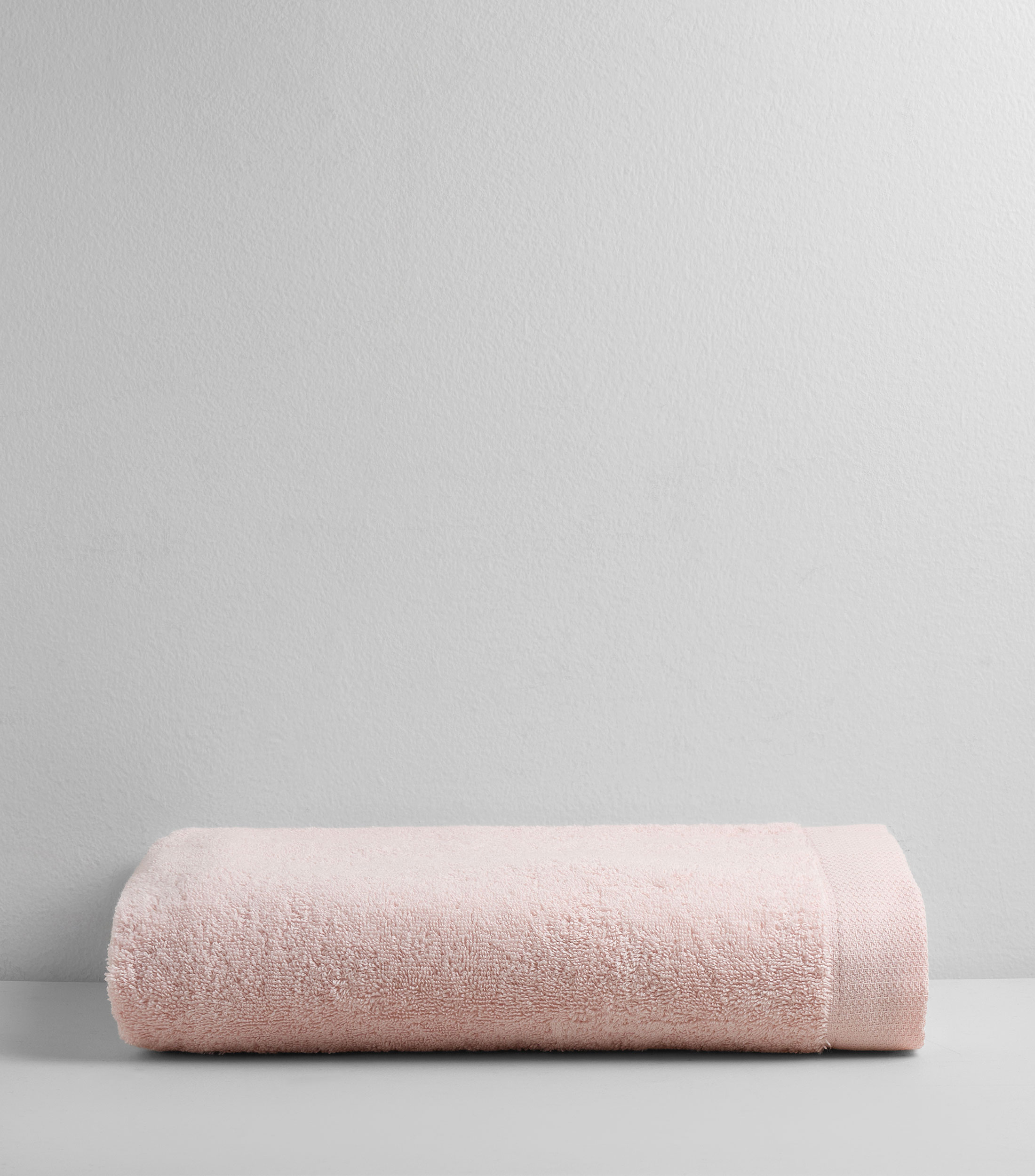Toalla medio baño rosa