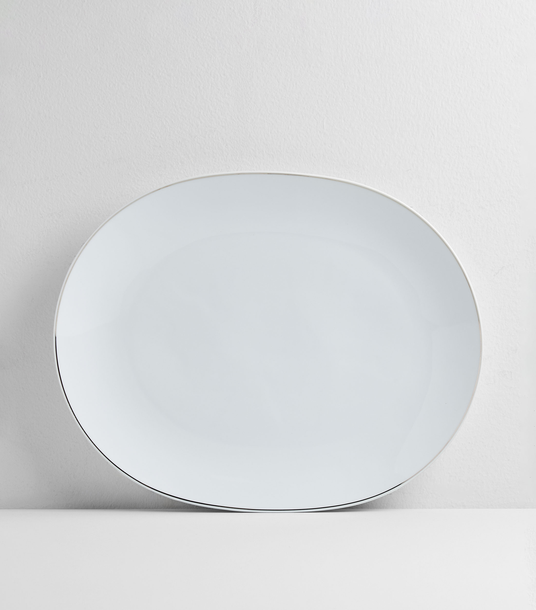 Platón ovalado Bright en porcelana blanca