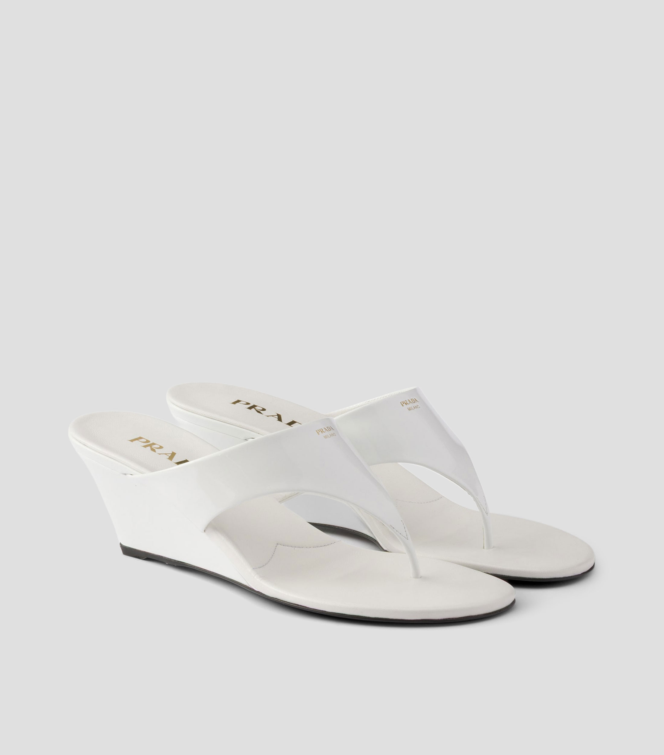 Sandalias en piel de tacón bajo de cuña Mujer