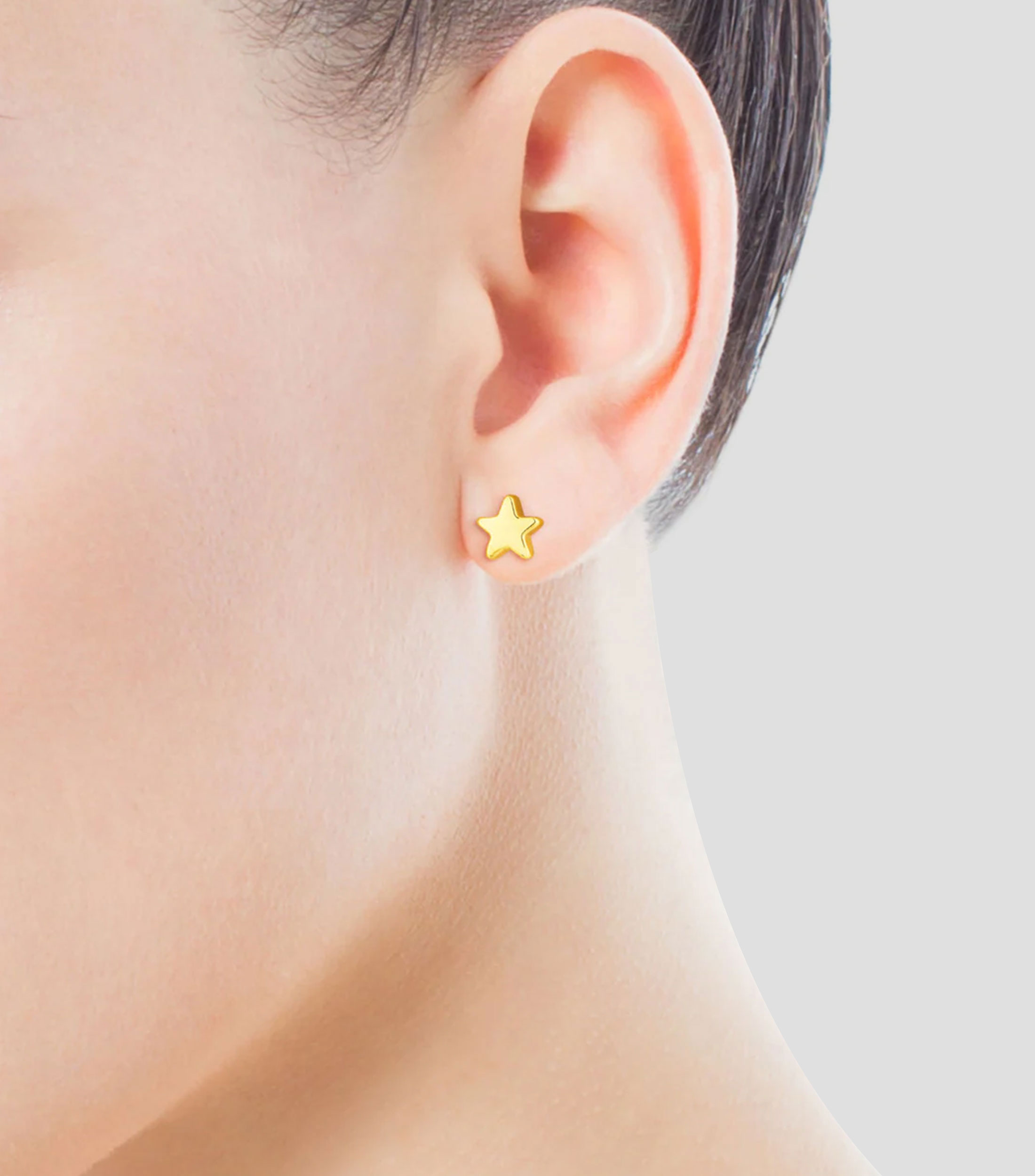 Aretes en oro amarillo de 18 kilates con forma de estrellas XXS Mujer