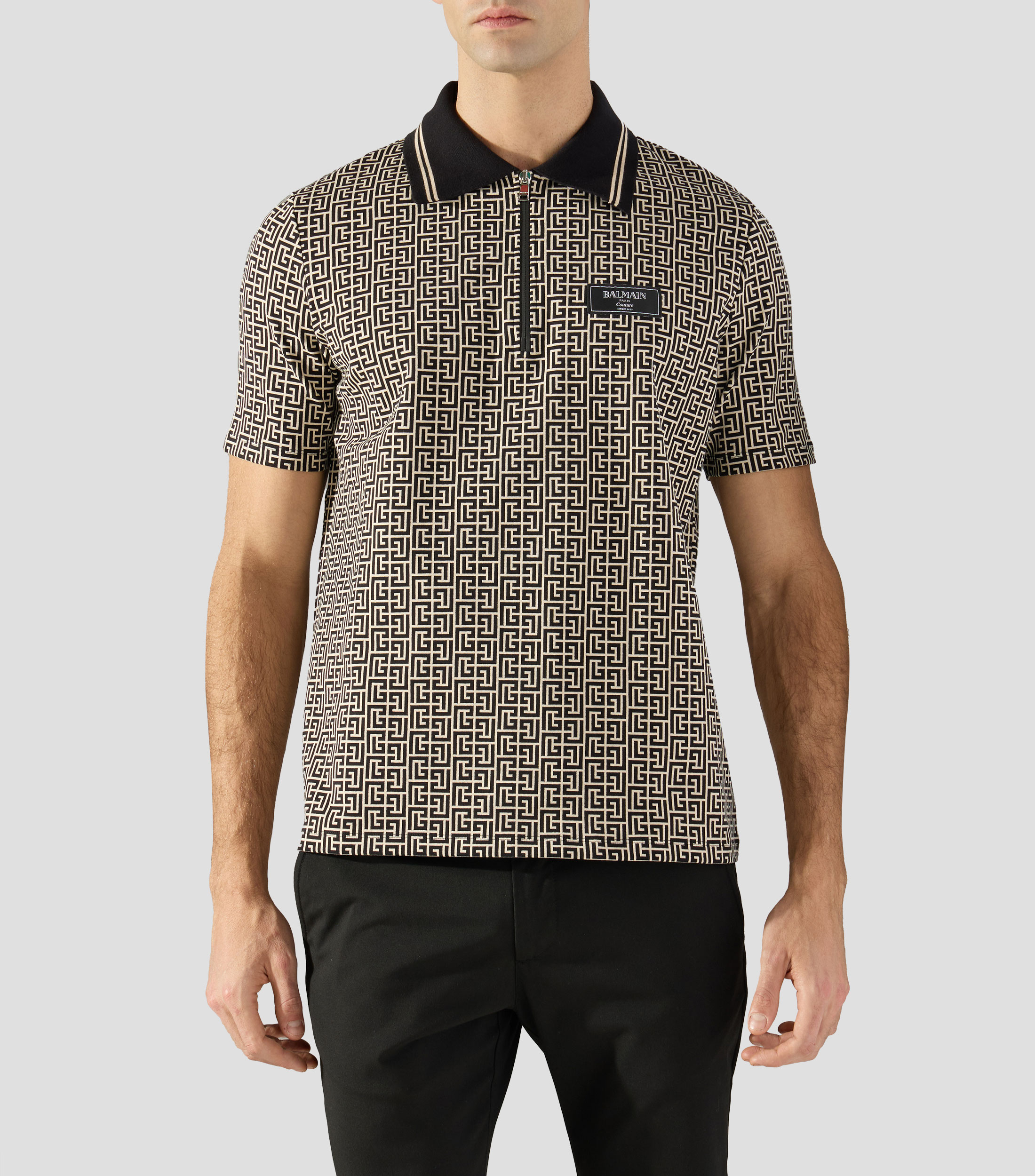 Playera tipo polo con manga corta estampada Hombre
