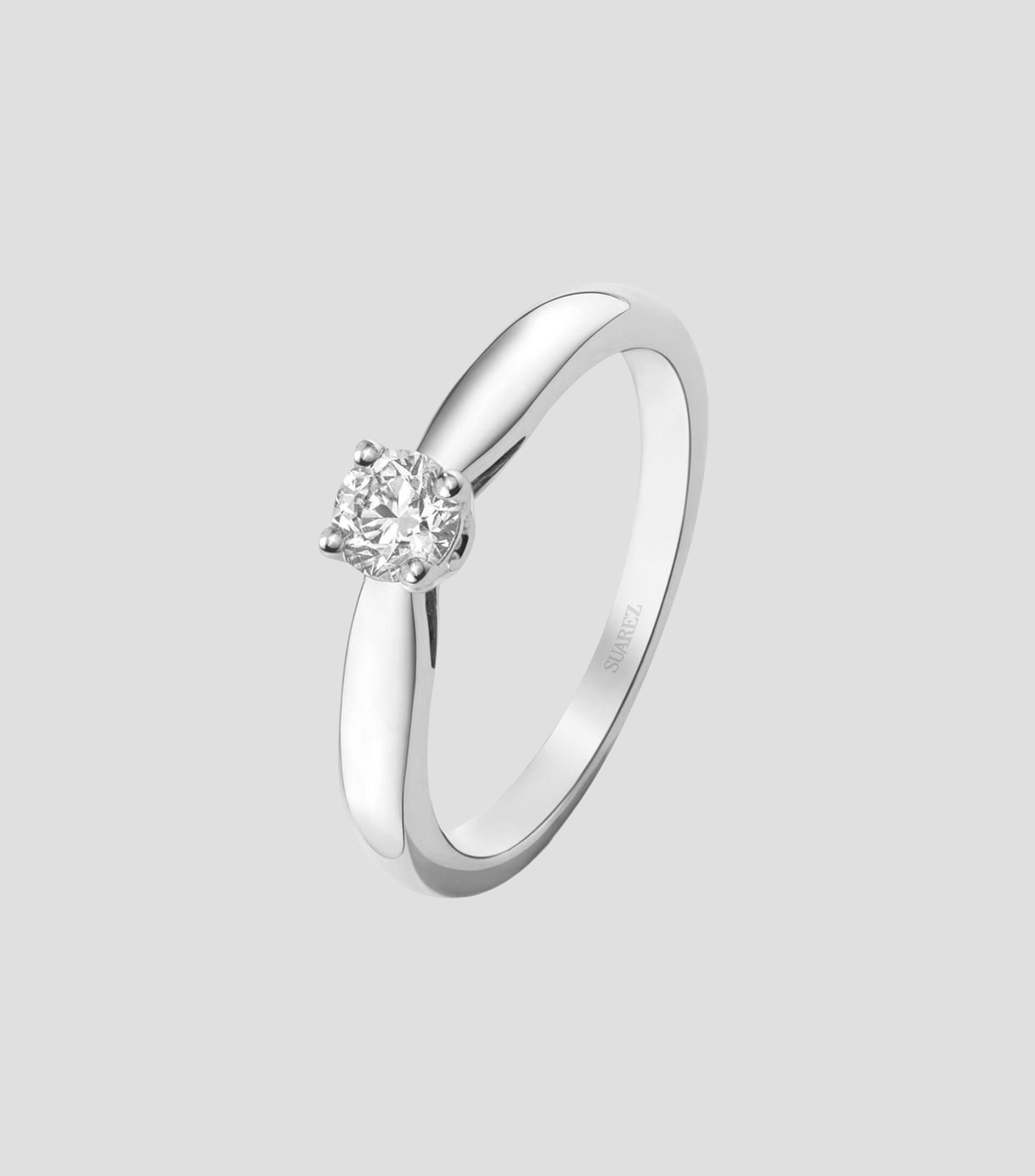 Anillo solitario en Oro blanco de 18 Kilates con diamante Mujer