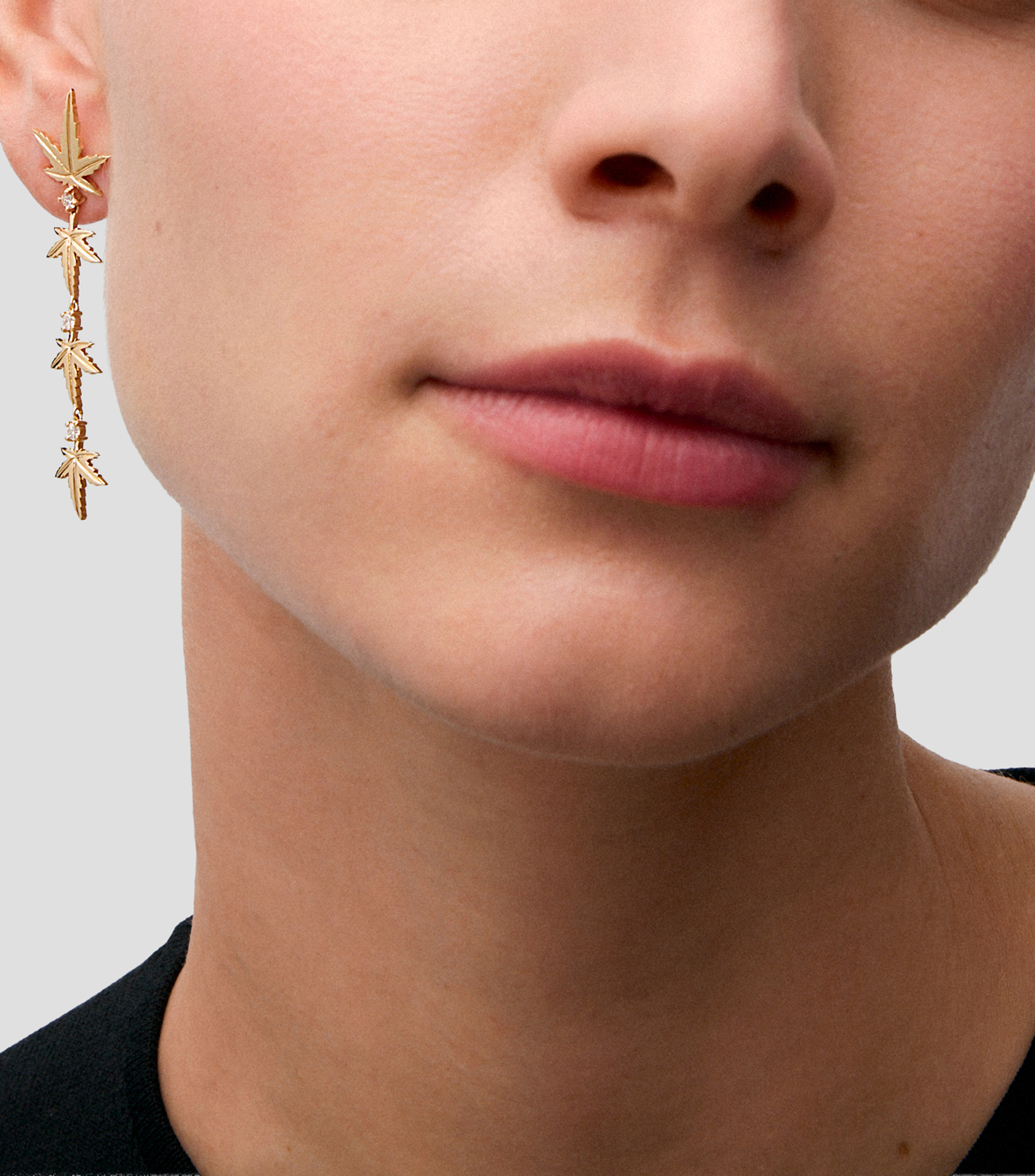 Aretes en oro amarillo con incrustación de diamante Mujer