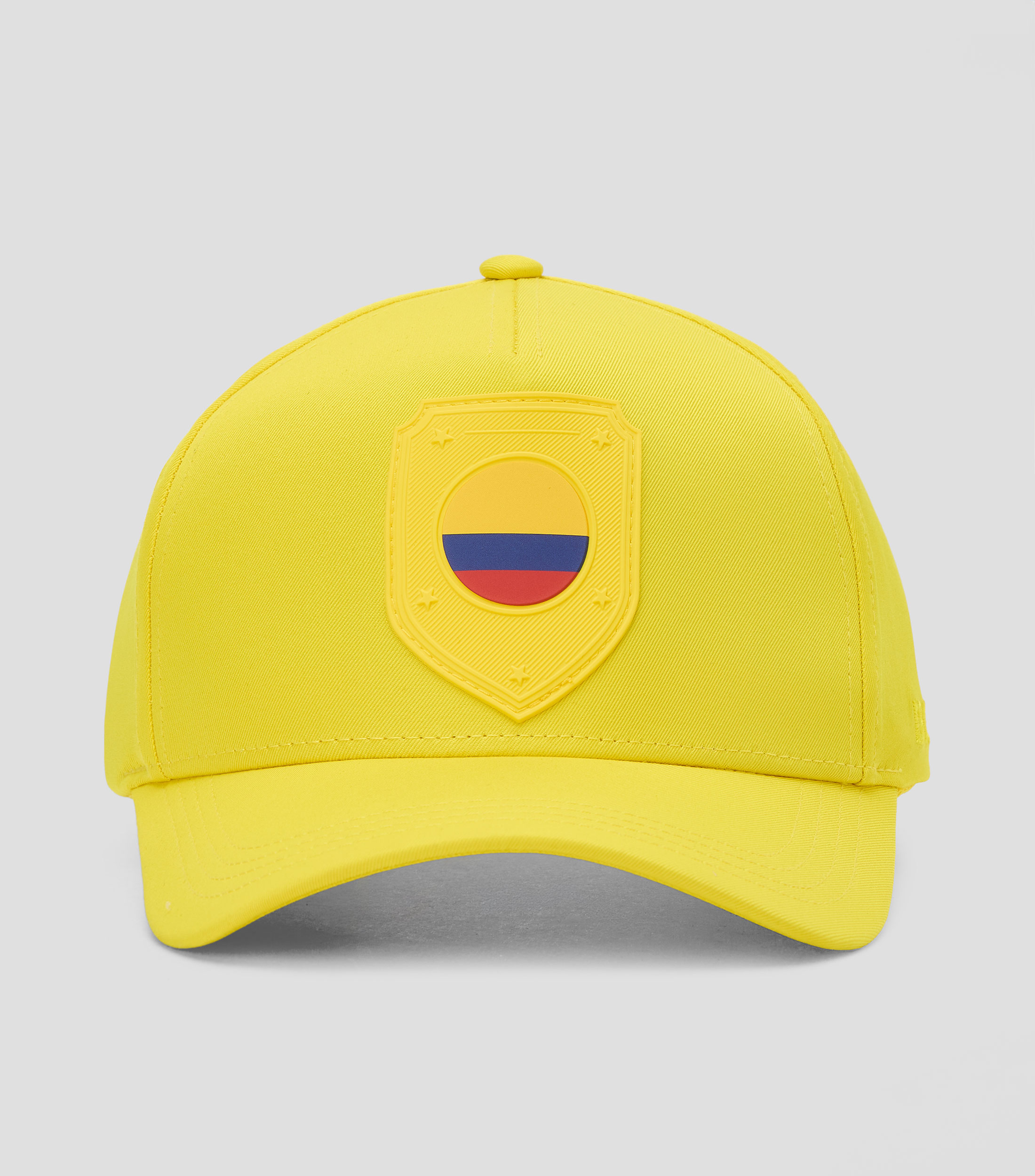 Gorra con escudo de Colombia amarilla Hombre
