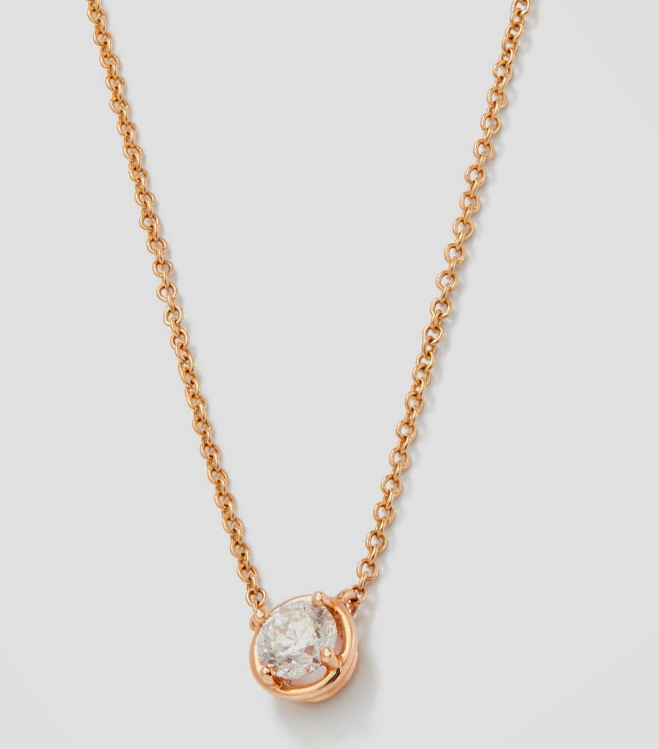 Collar oro de 18 kilates con dije de diamante Mujer