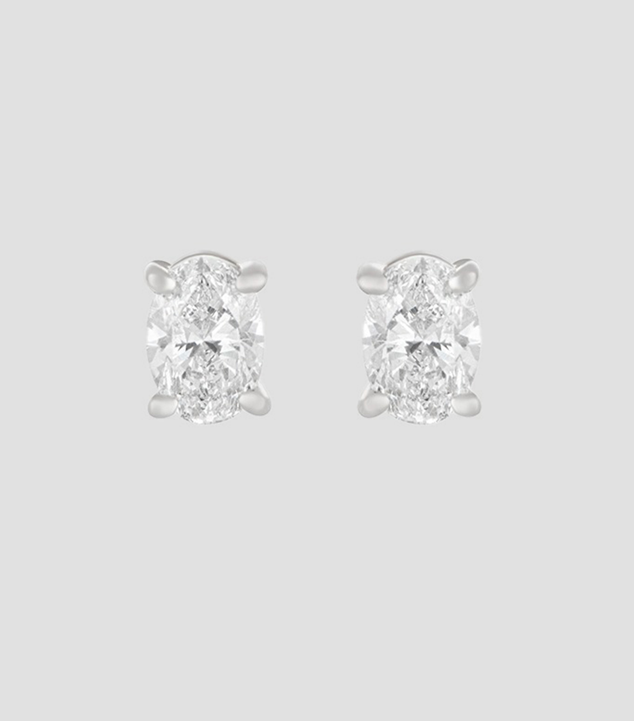 Broqueles en oro blanco de 18 kilates con diamantes Mujer