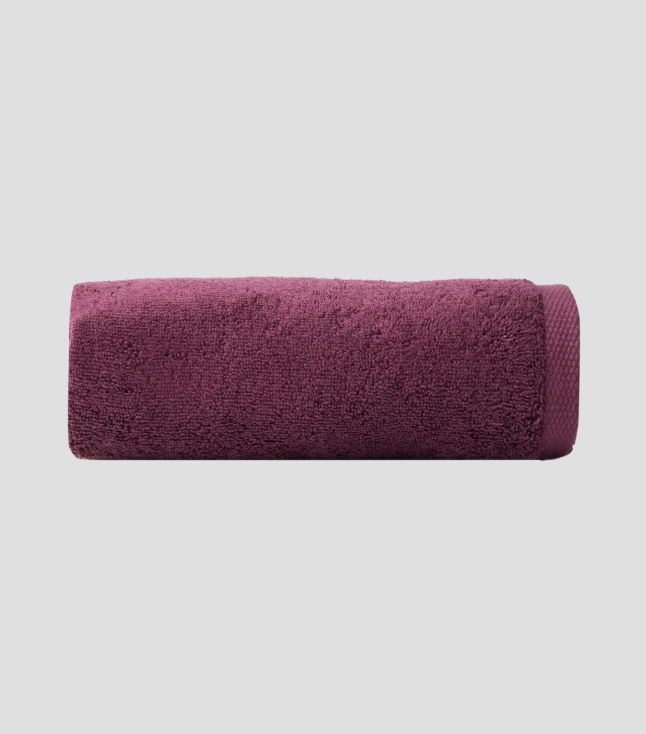 Toalla de medio baño púrpura