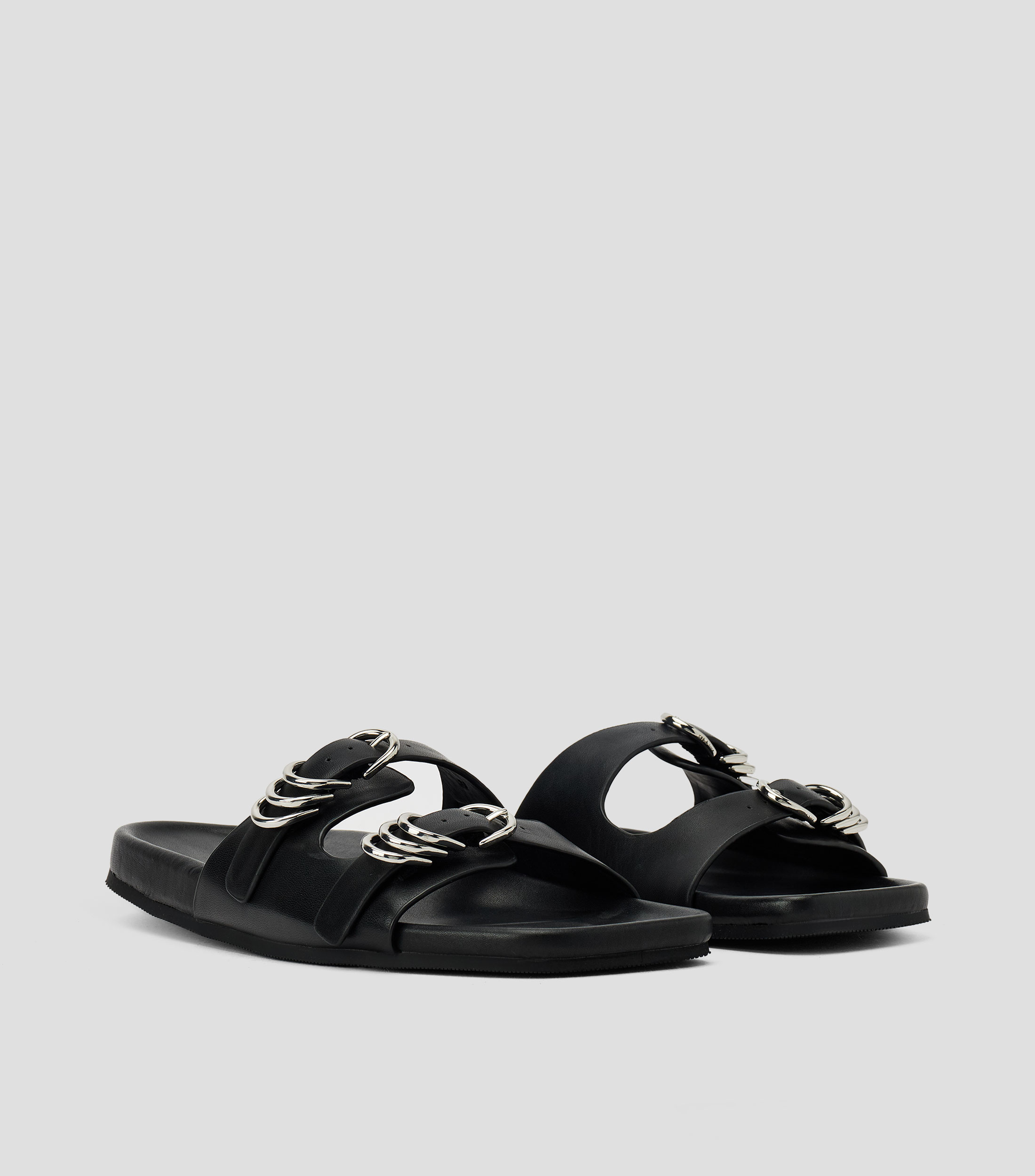 Sandalias planas en piel Mujer