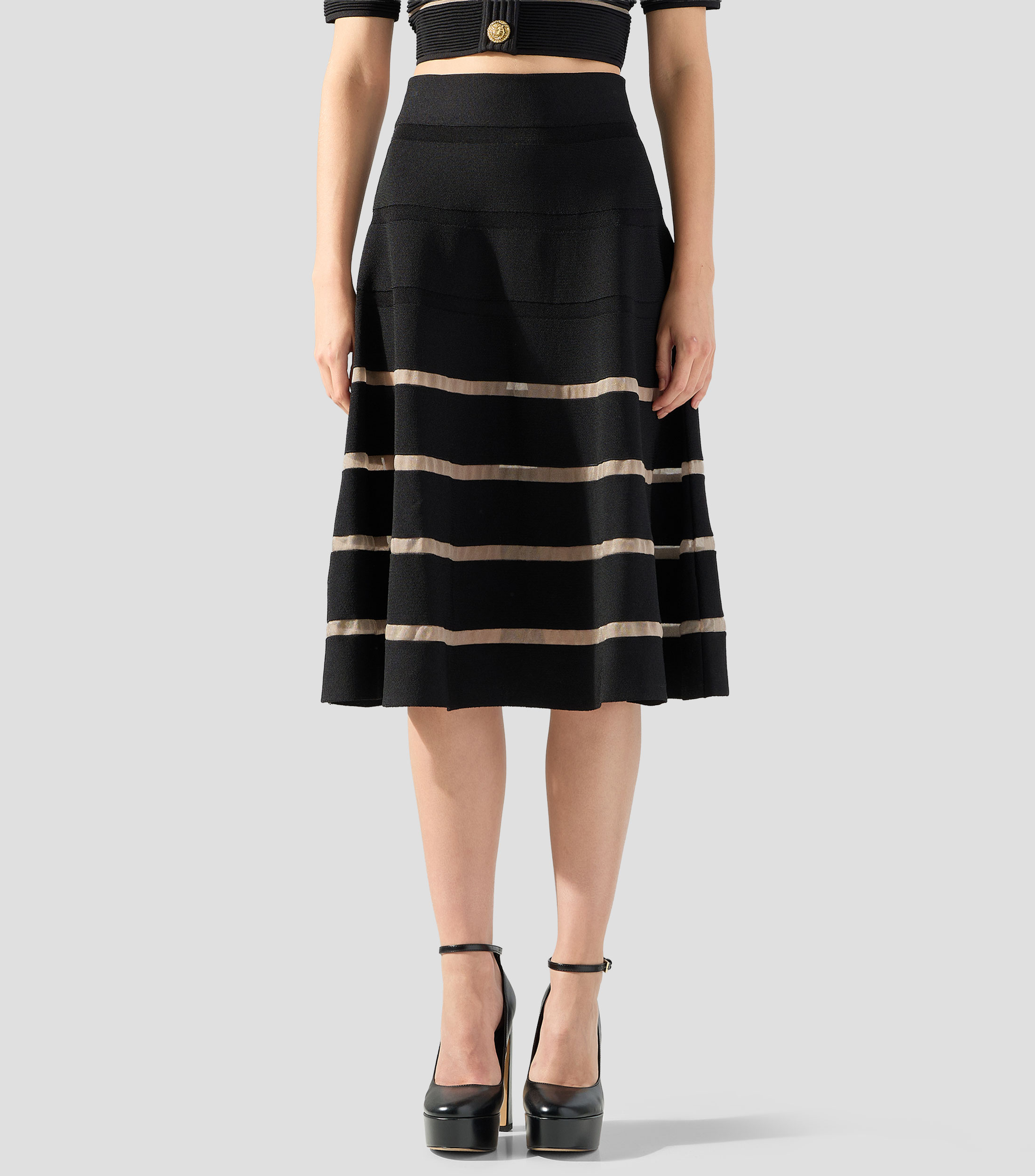 Falda midi de corte evasé con rayas Mujer