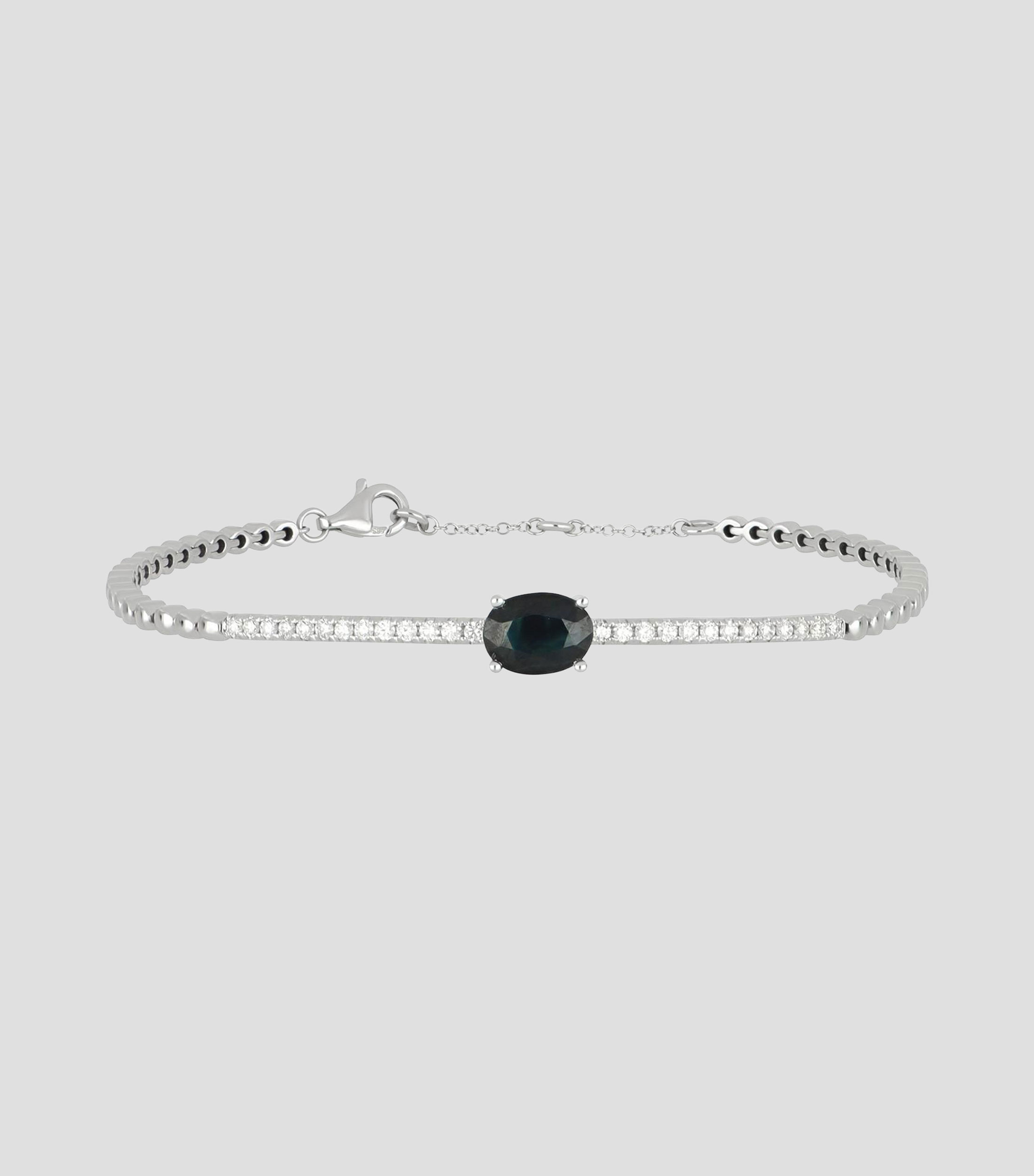 Pulsera en Oro blanco de 14 Kilates con zafiro y diamantes Mujer