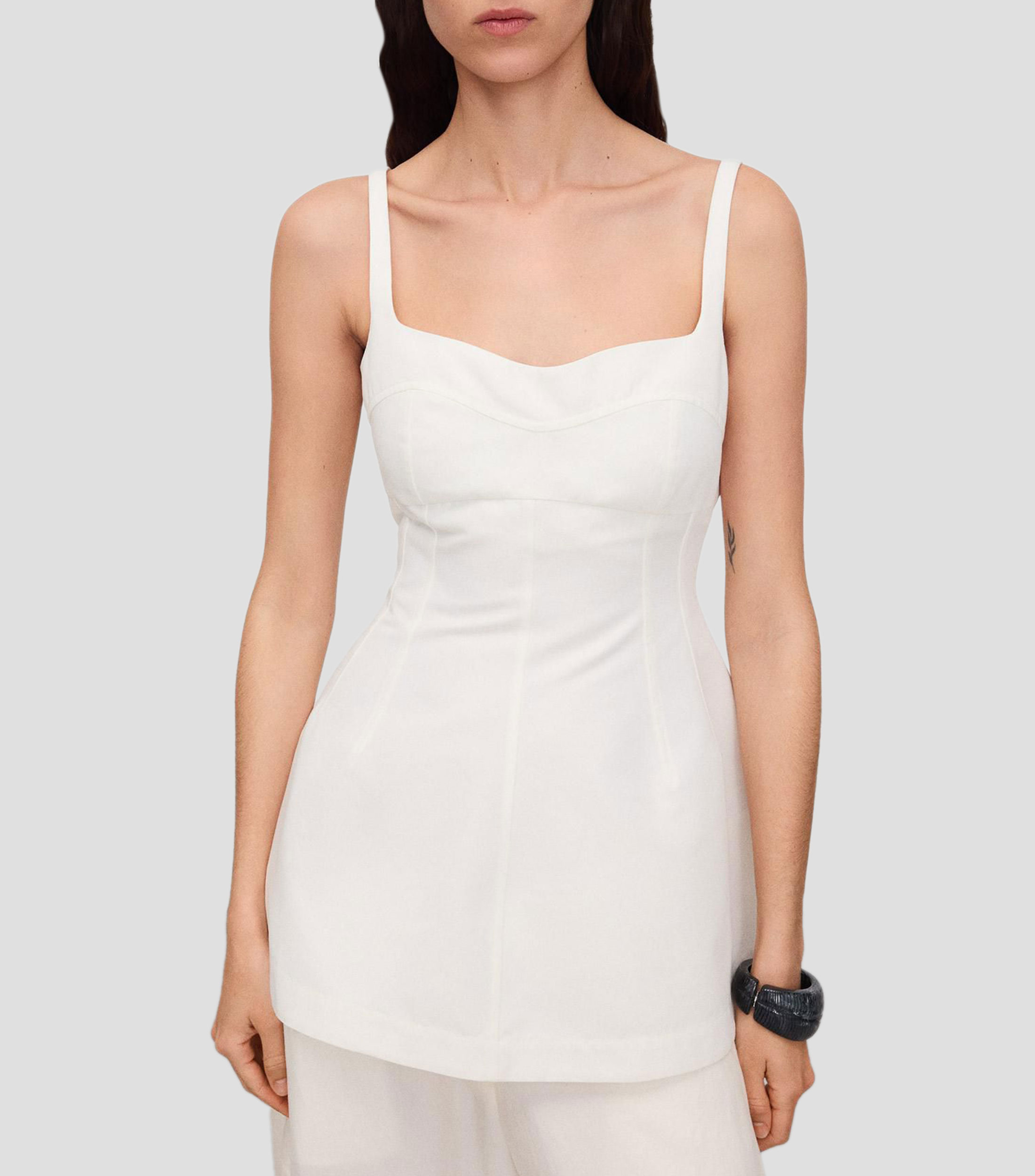 Blusa lisa sin mangas Mujer