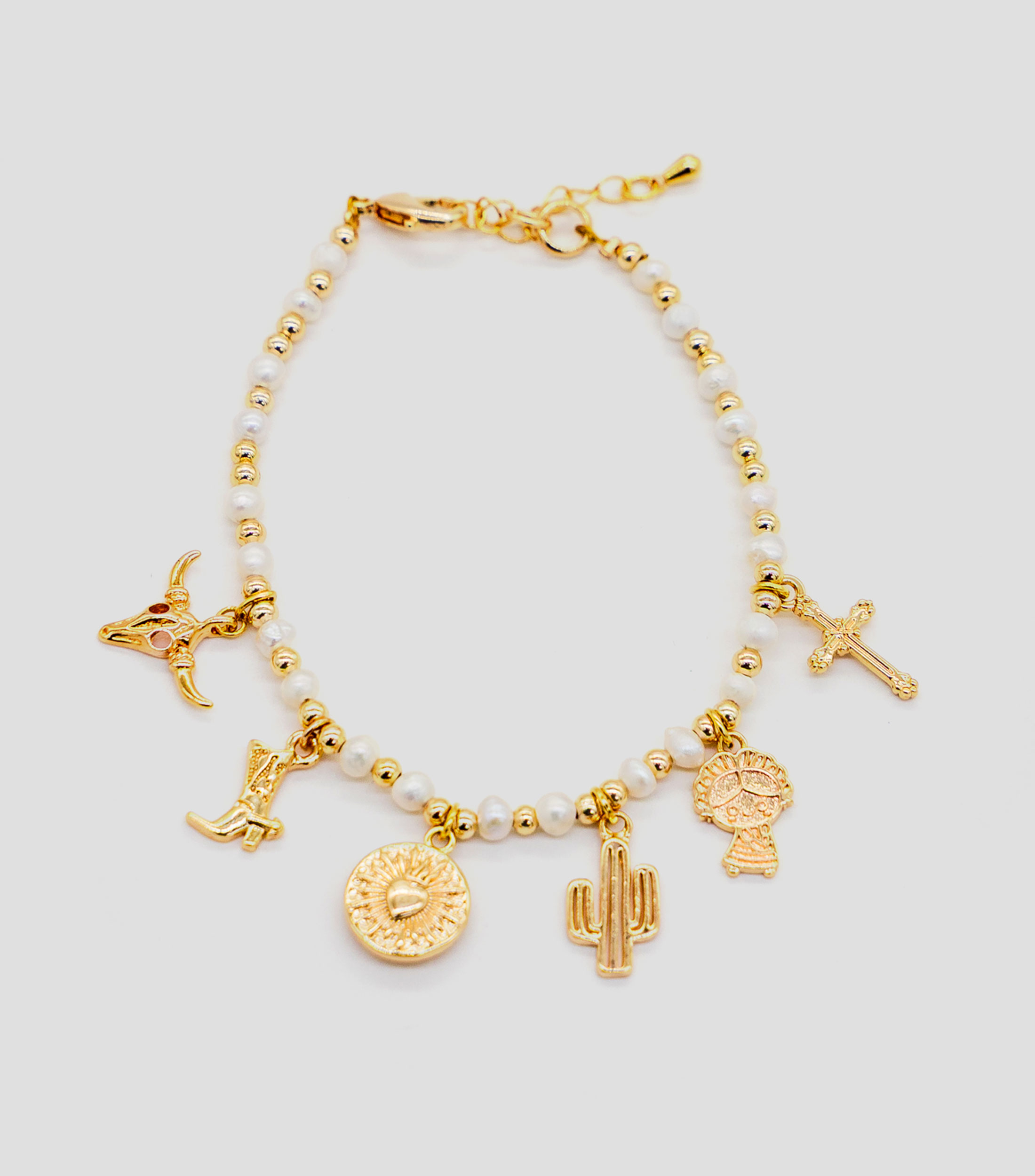 Pulsera con dijes decorativos Mujer