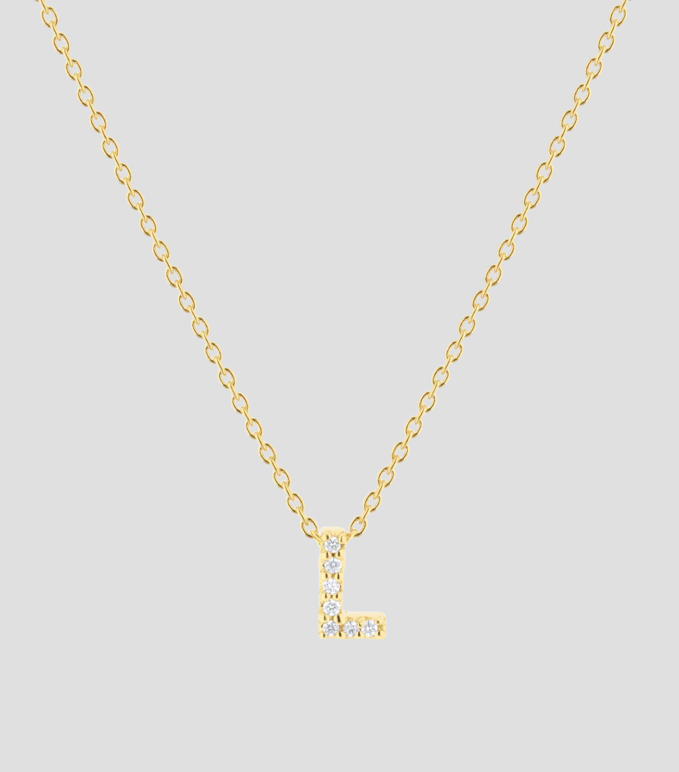 Collar en Oro amarillo de 18 Kilates letra L con diamantes Mujer