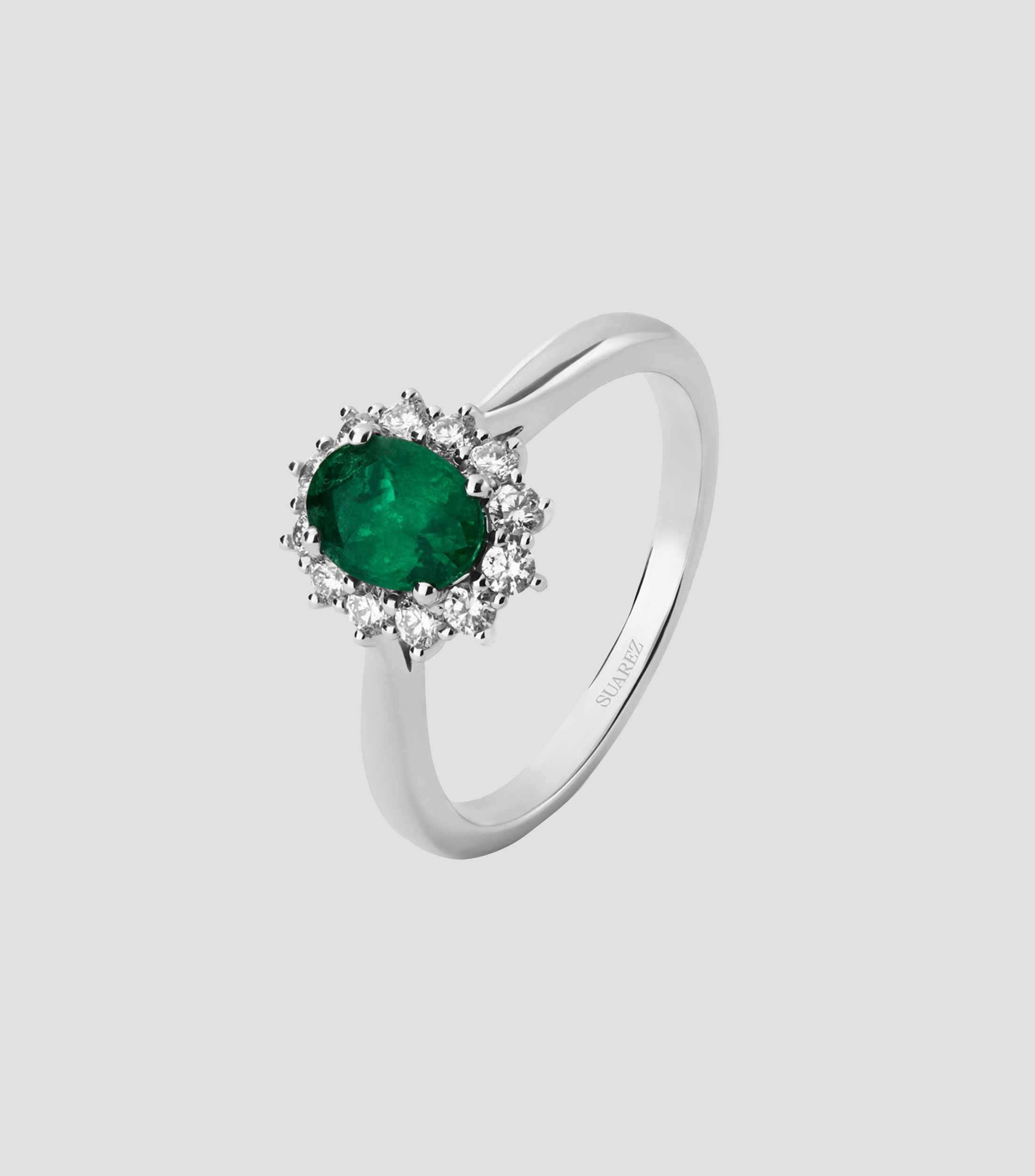 Anillo media alianza en Oro blanco de 18 Kilates con diamantes y esmeralda Mujer