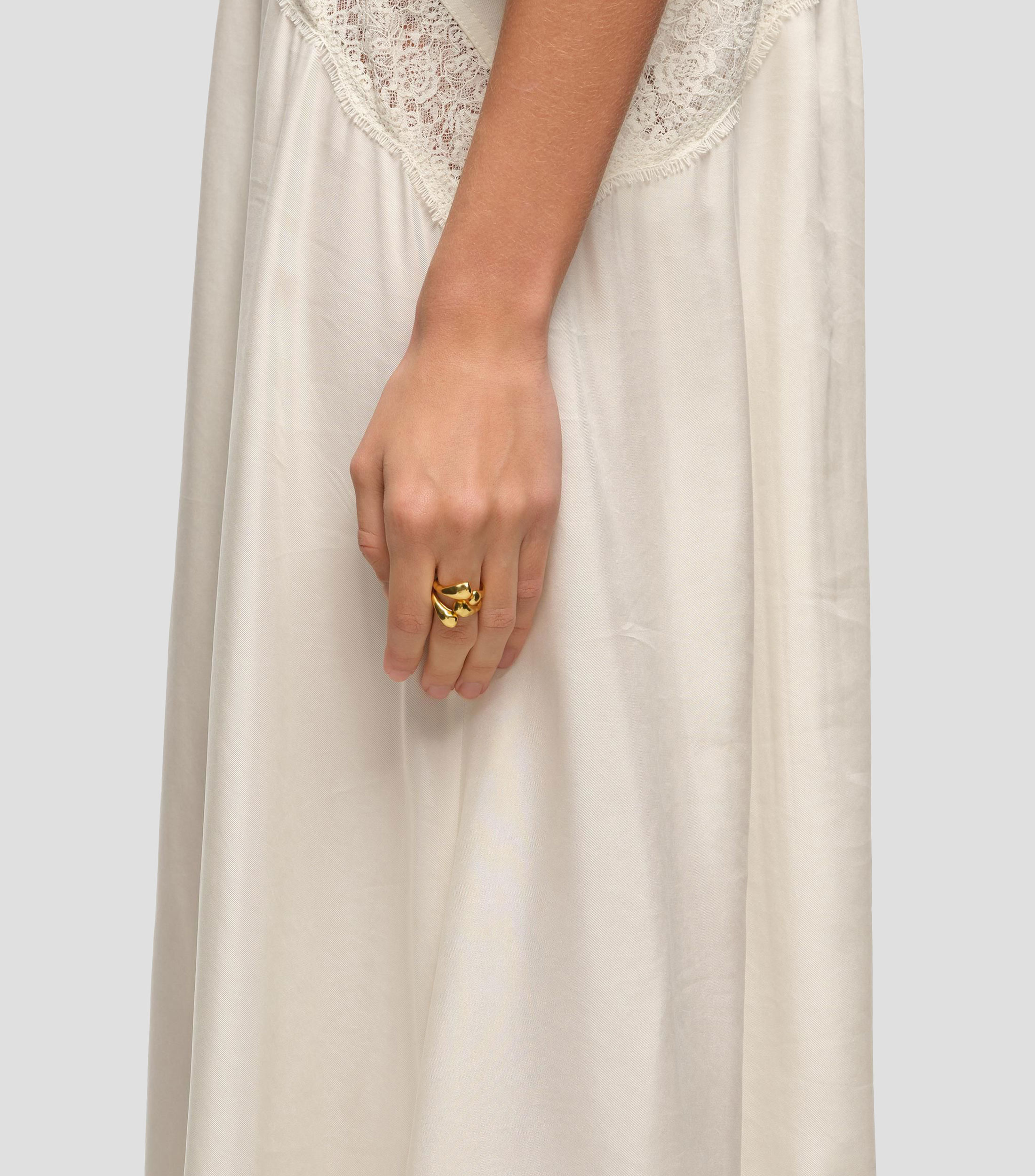 Anillo cruzado con textura Mujer