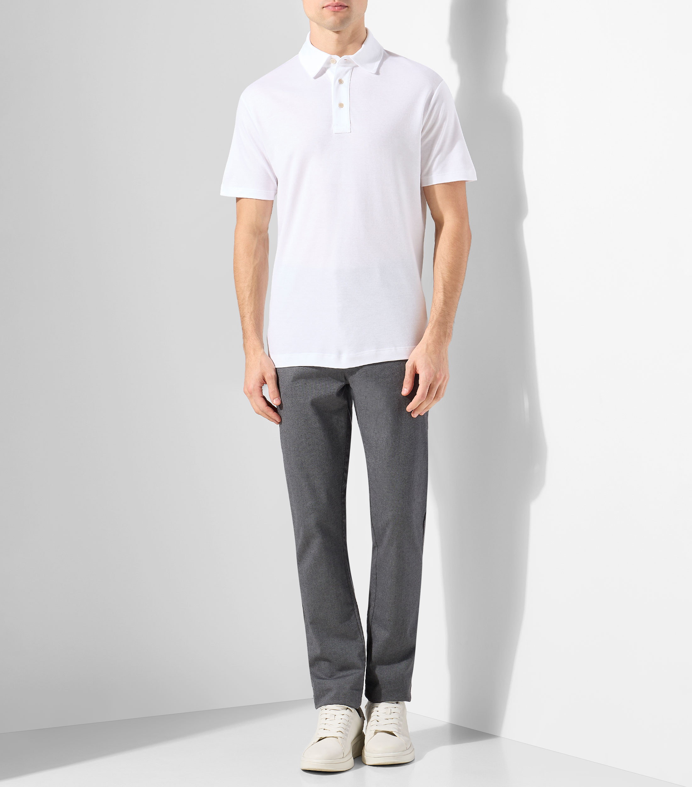 Playera tipo polo con manga corta lisa Hombre