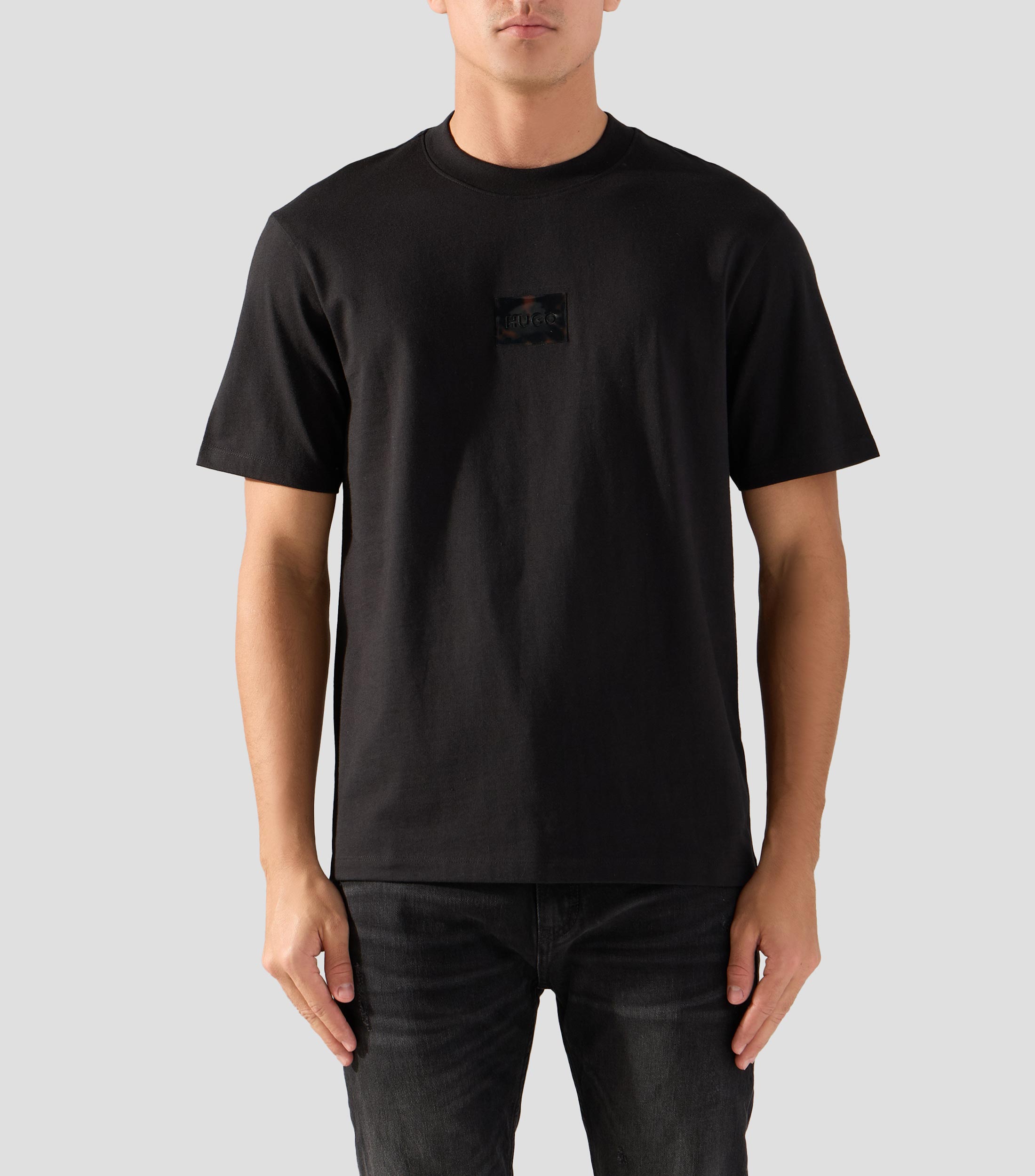 Playera de punto de algodón con parche de logo de carey Hombre