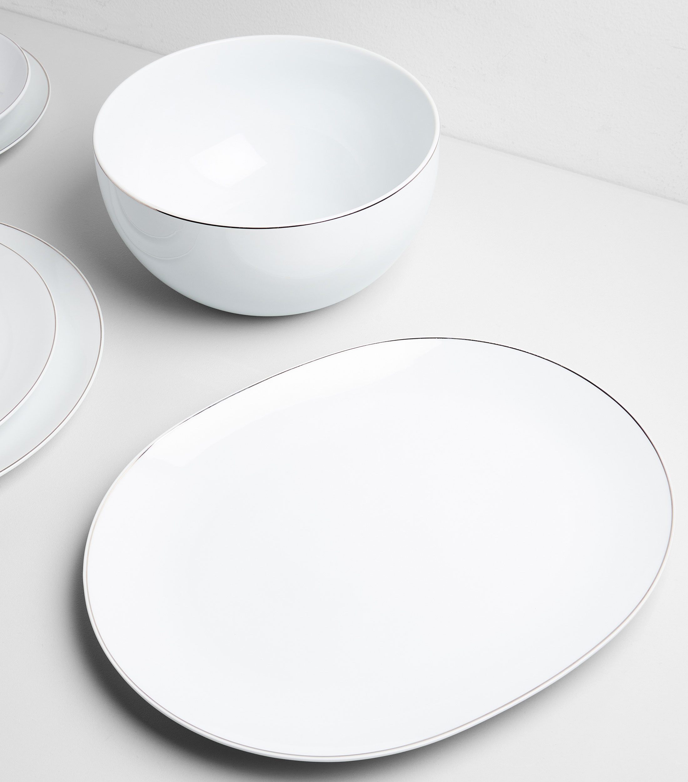 Platón ovalado Bright en porcelana blanca
