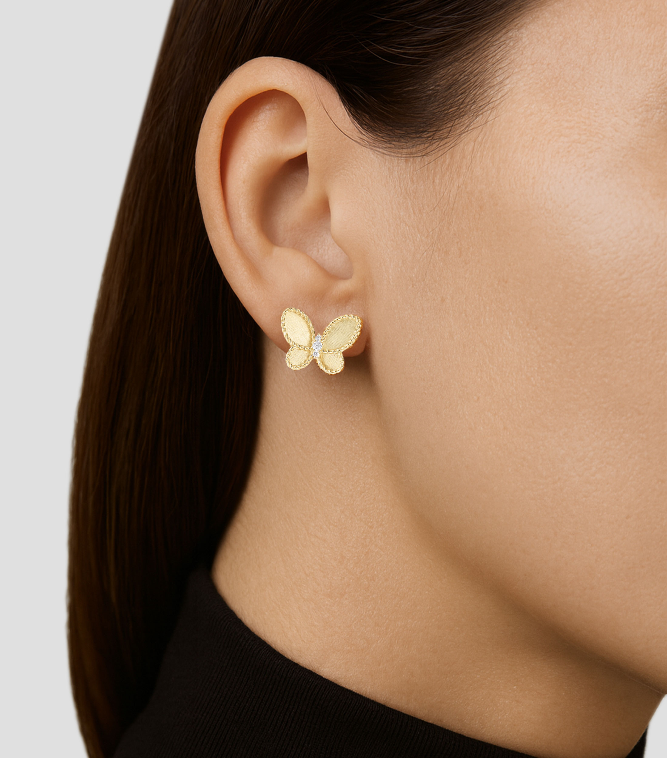 Aretes en oro amarillo de 18 kilates mariposa Mujer
