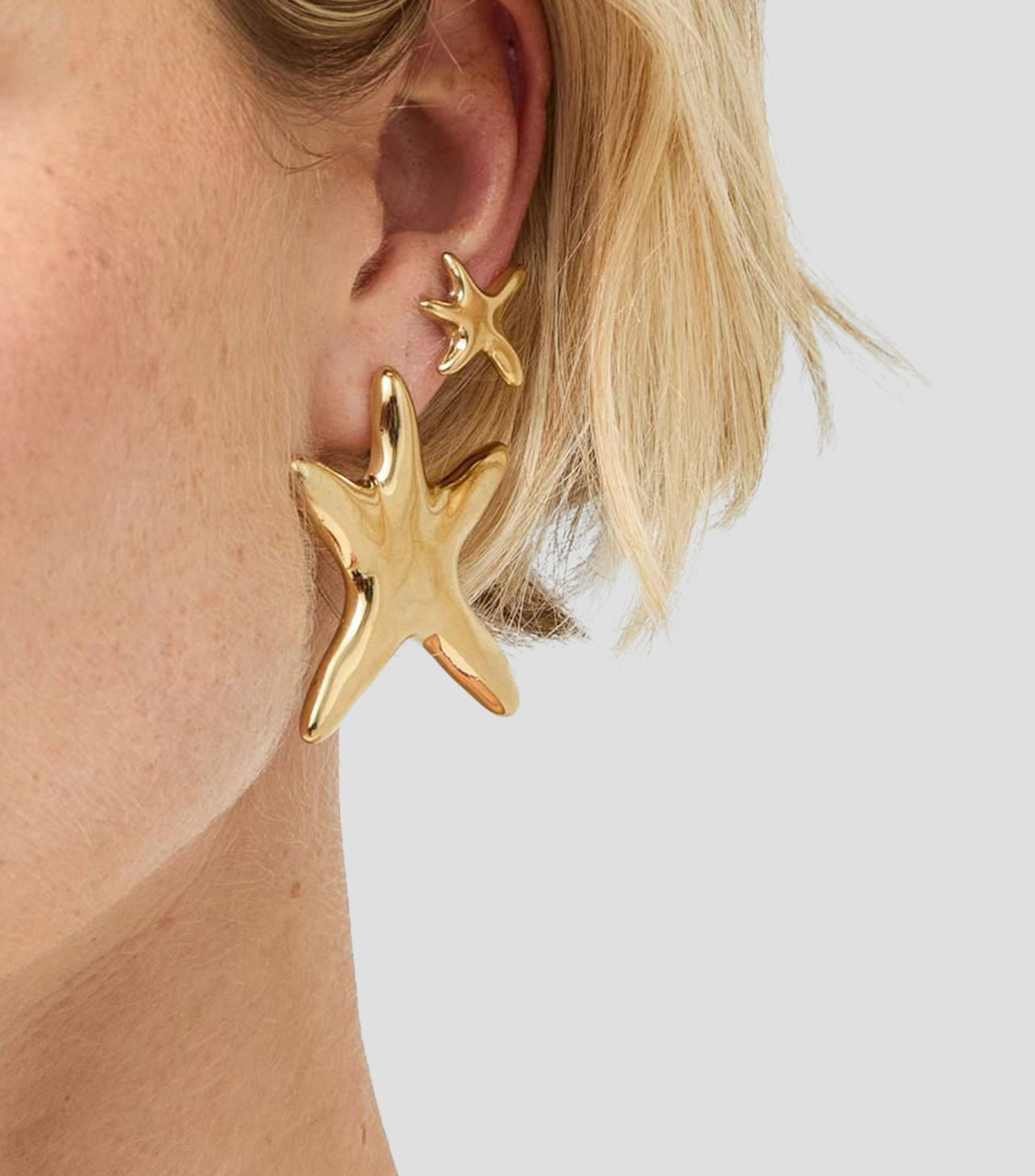 Aretes estrella Arcadia Mujer