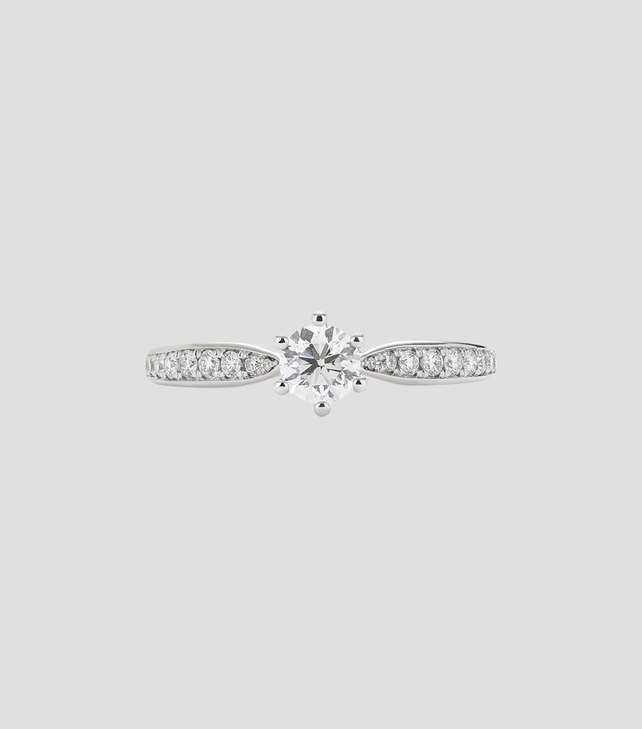 Anillo solitario de Oro blanco de 18 Kilates con diamante central Mujer