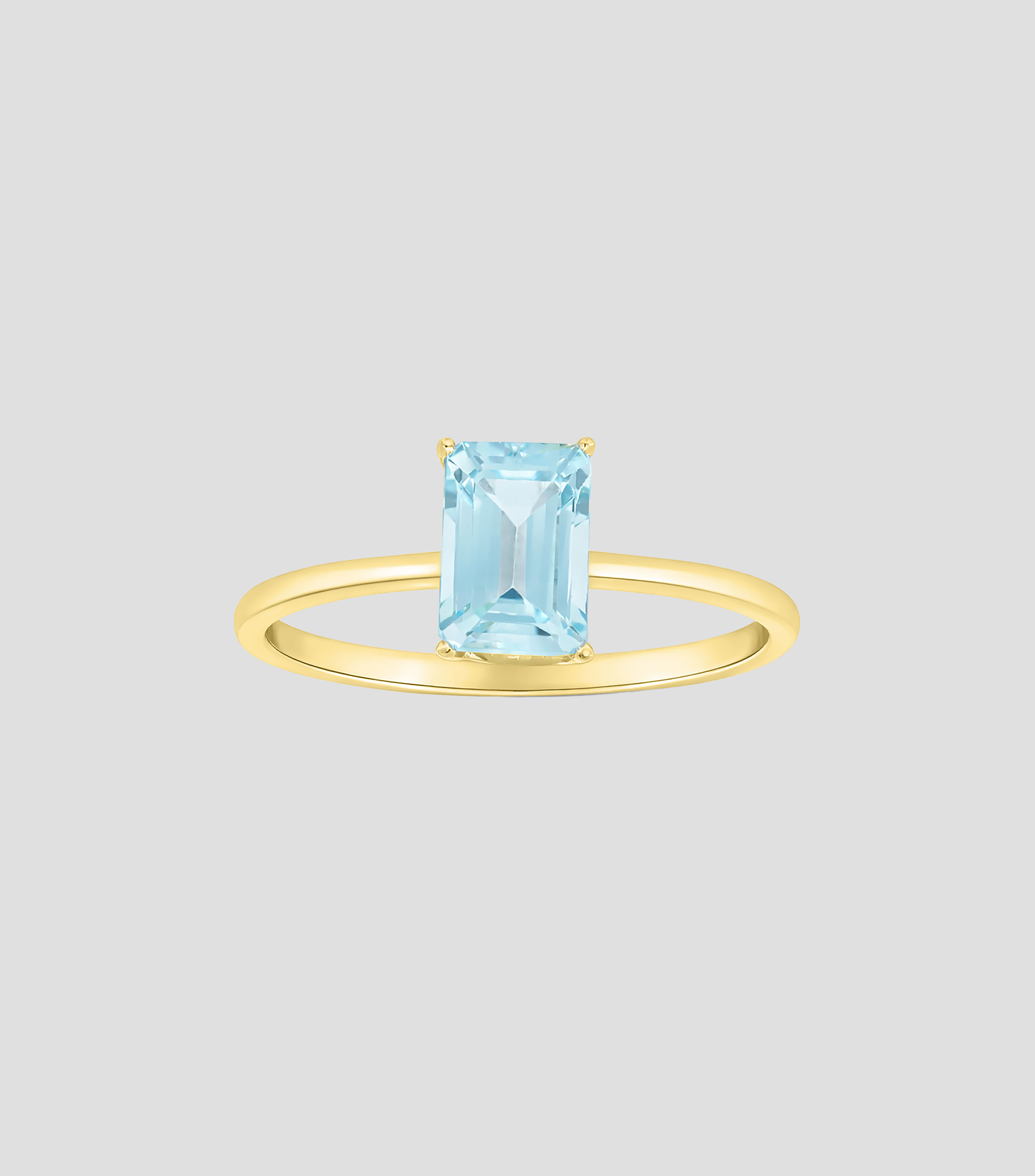Anillo en oro amarillo de 14 kilates con topacio azul Mujer