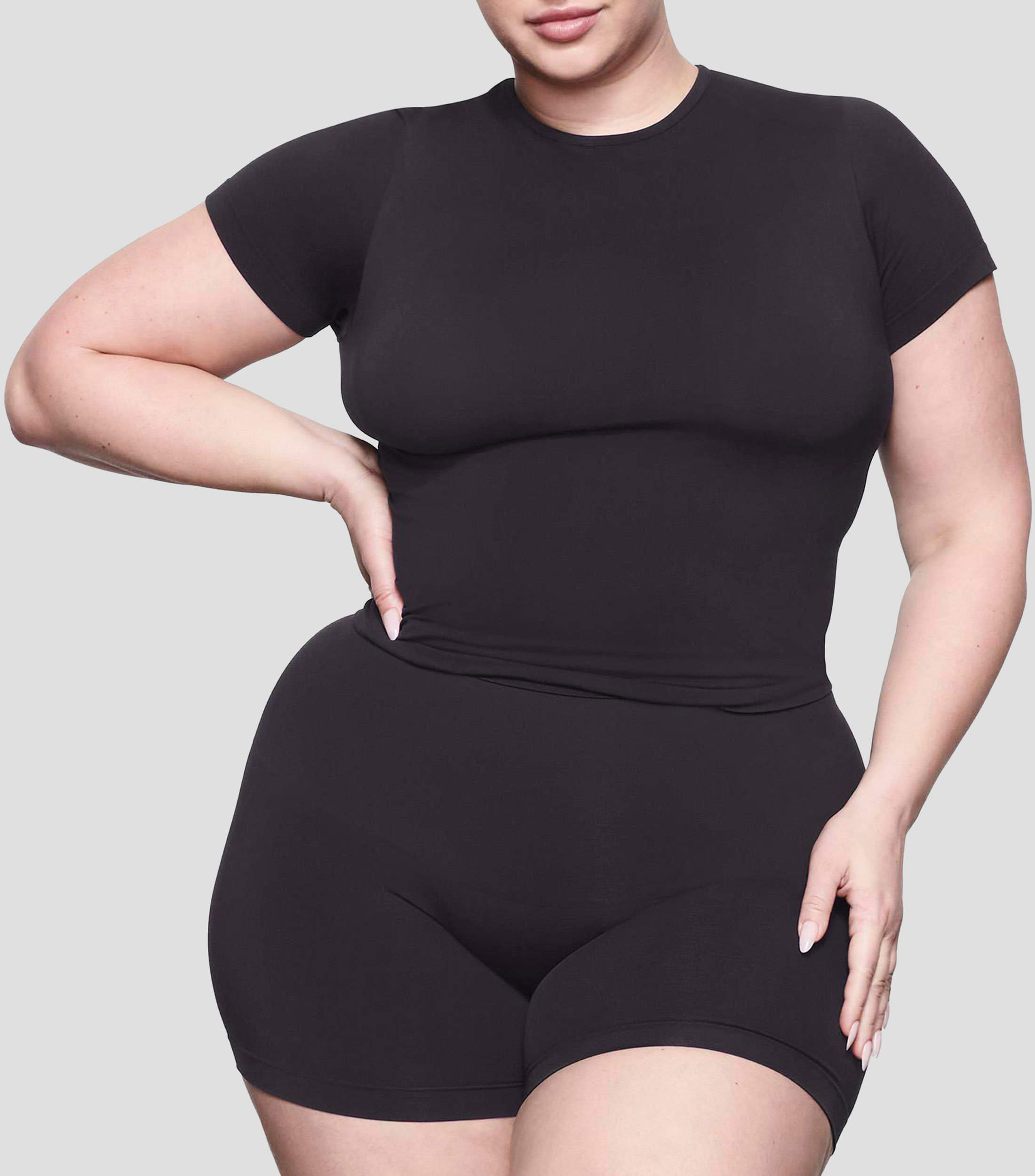 Playera de cuello redondo con manga corta lisa Mujer
