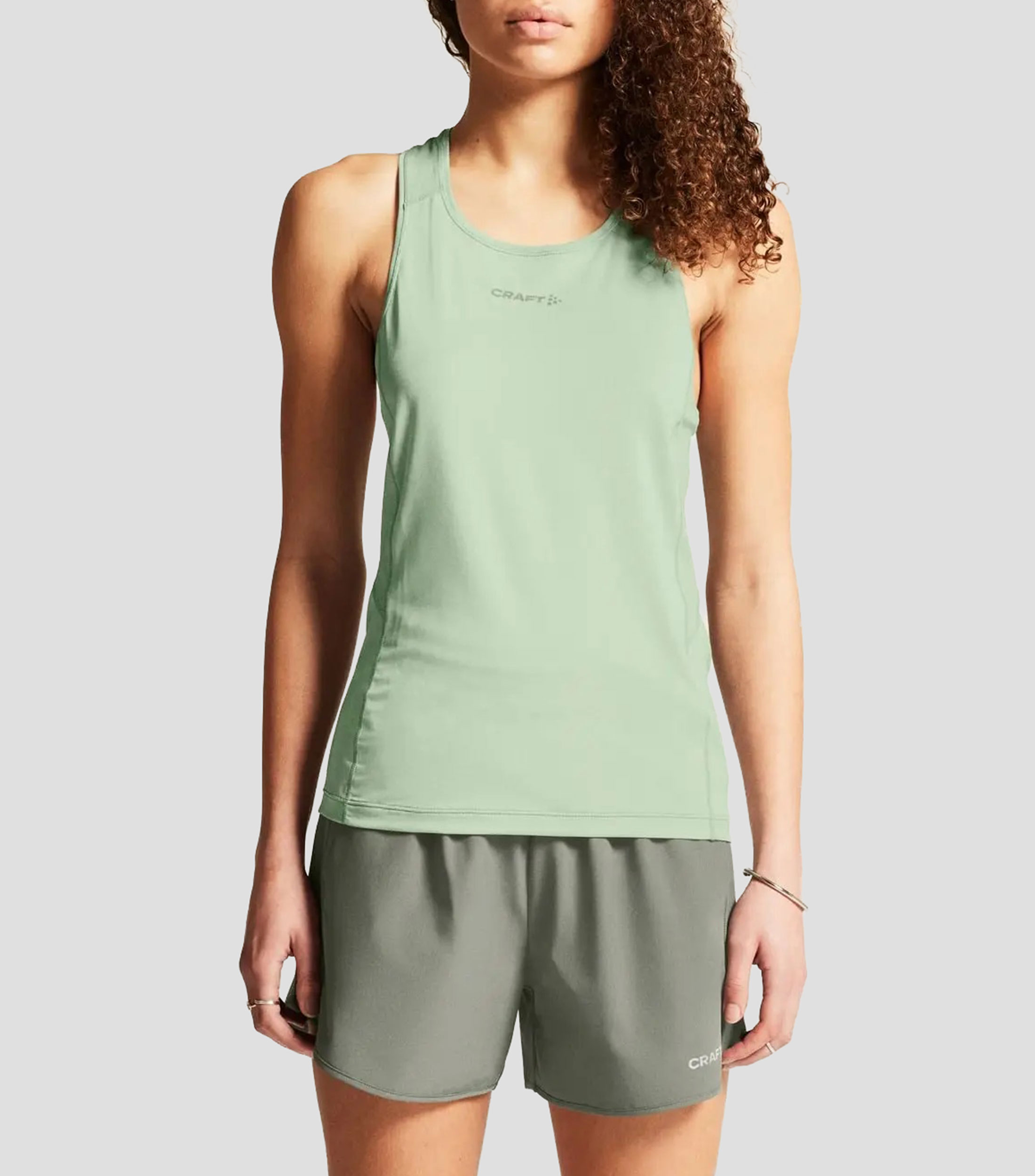 Playera para entrenamiento cuello redondo sin mangas lisa Mujer