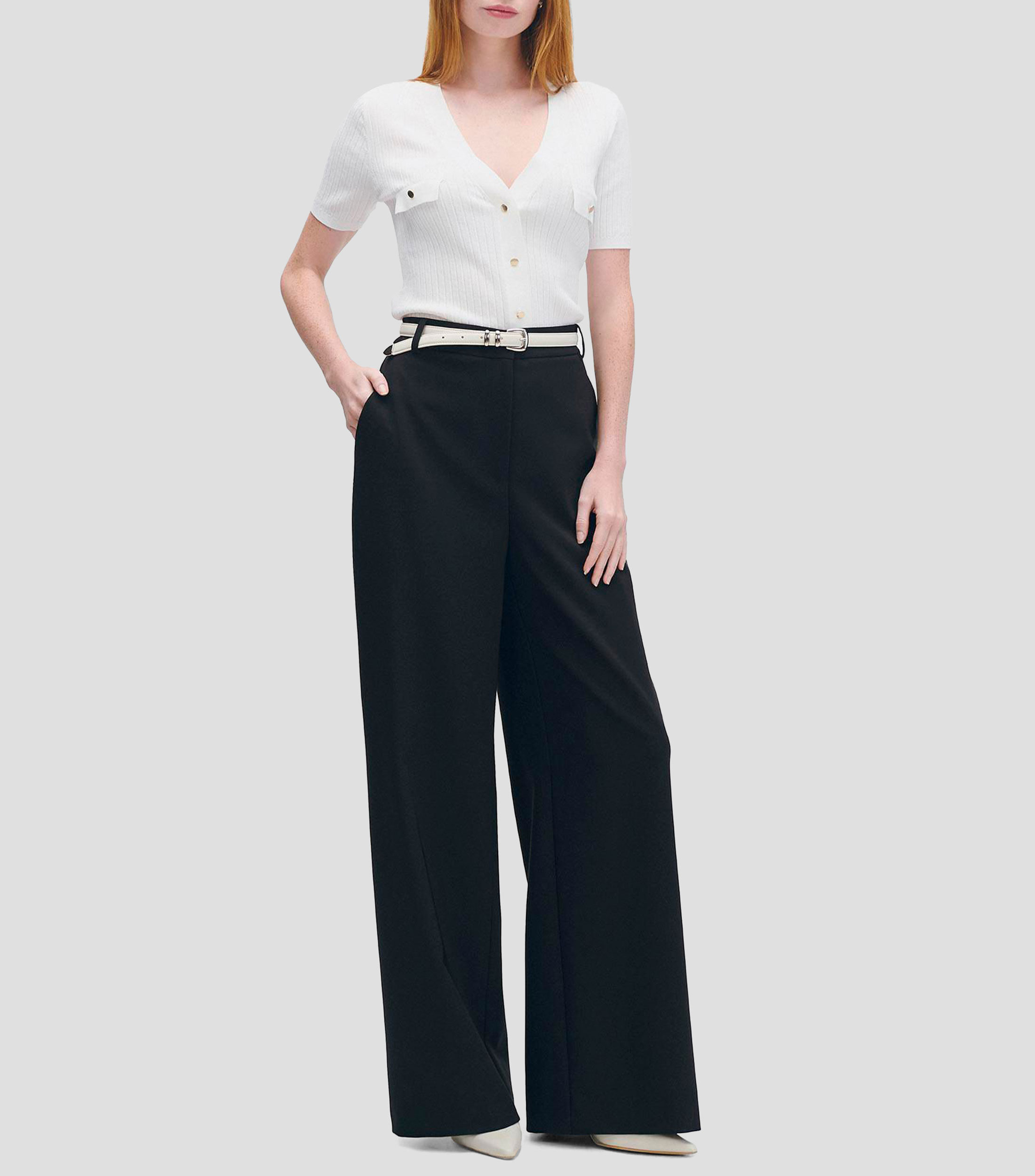 Blusa tejido canalé escote V aletilla y bolsillos simulados Mujer
